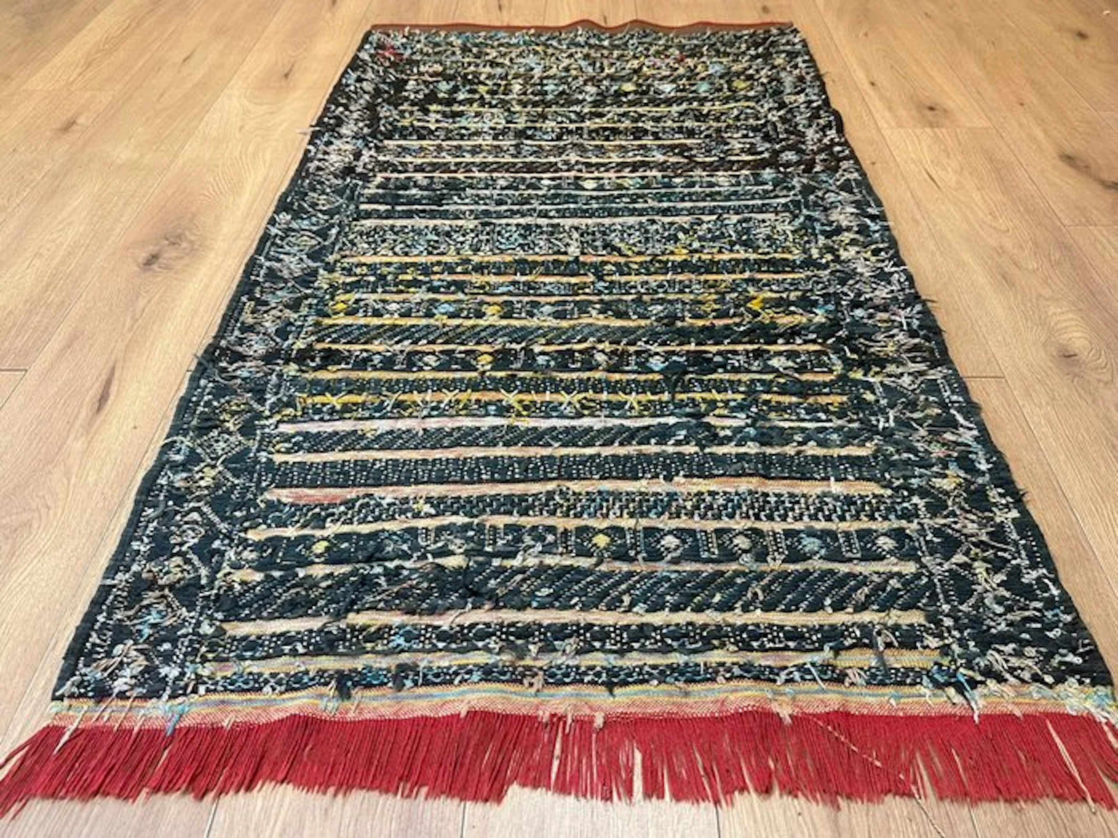 Handwoven Moroccan Berber kilim with a traditional...