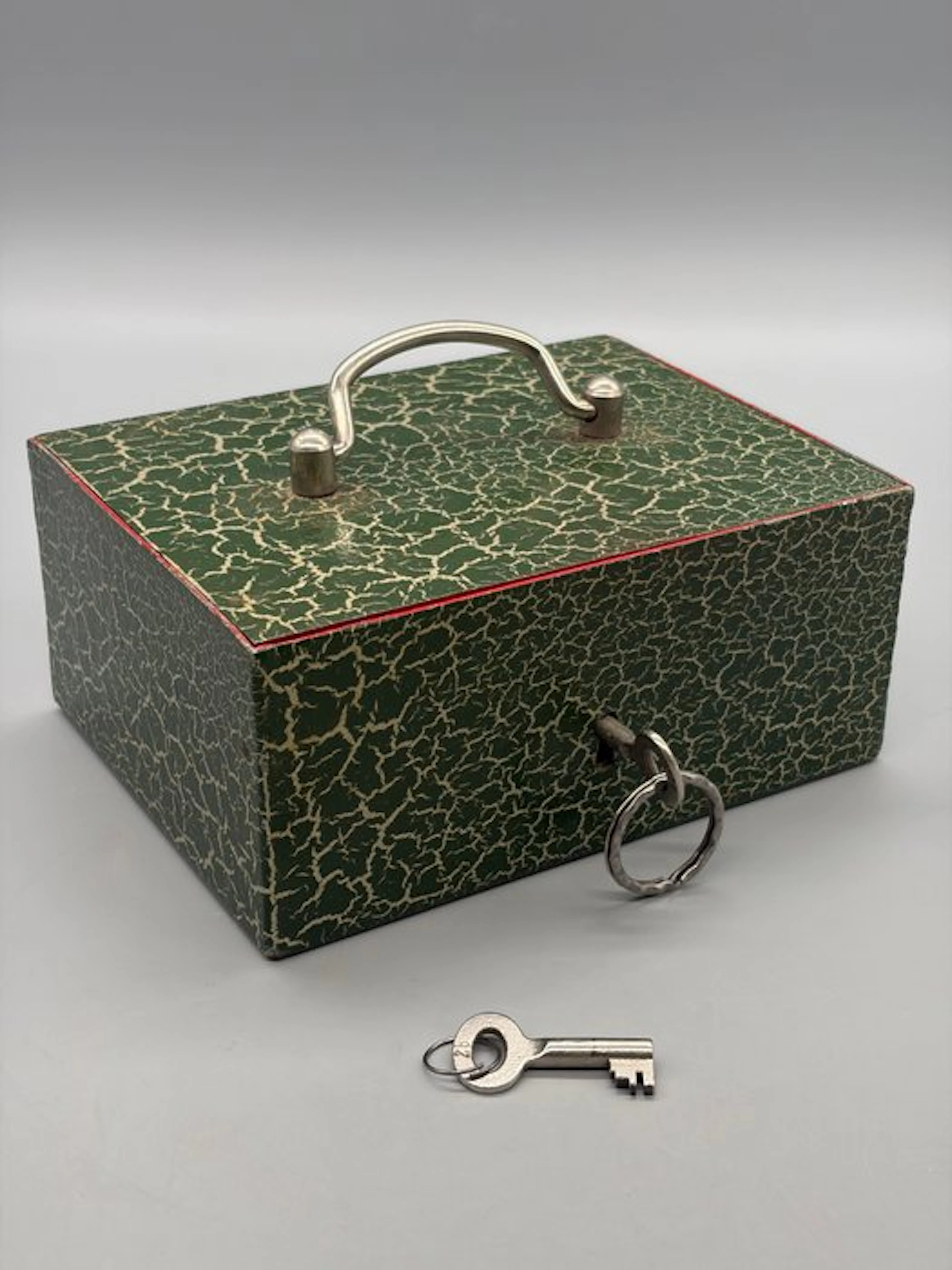 Casket - Antique metal valuables box with a craquelé green-and-red finish