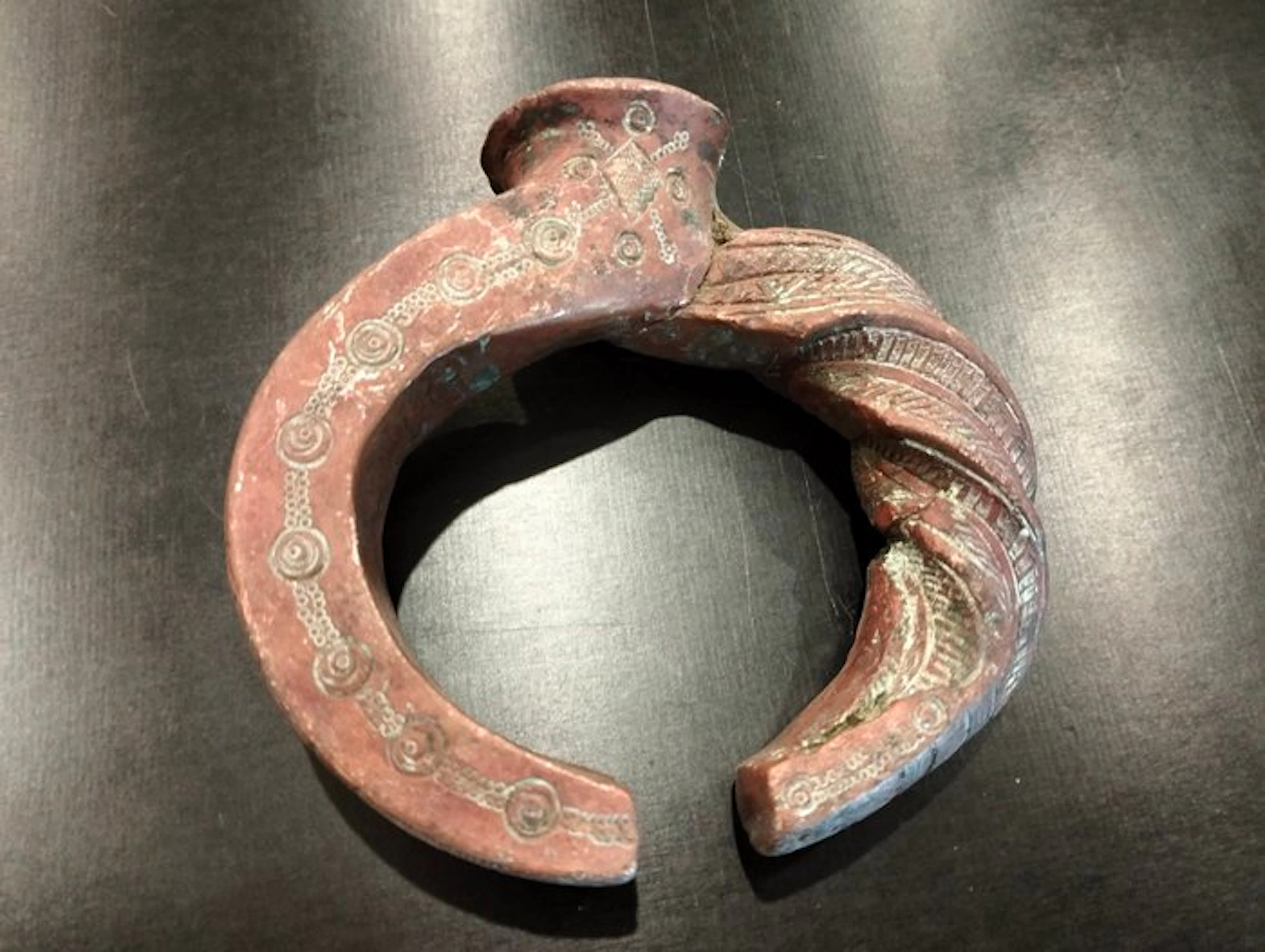 Remarkable twisted coin bracelet