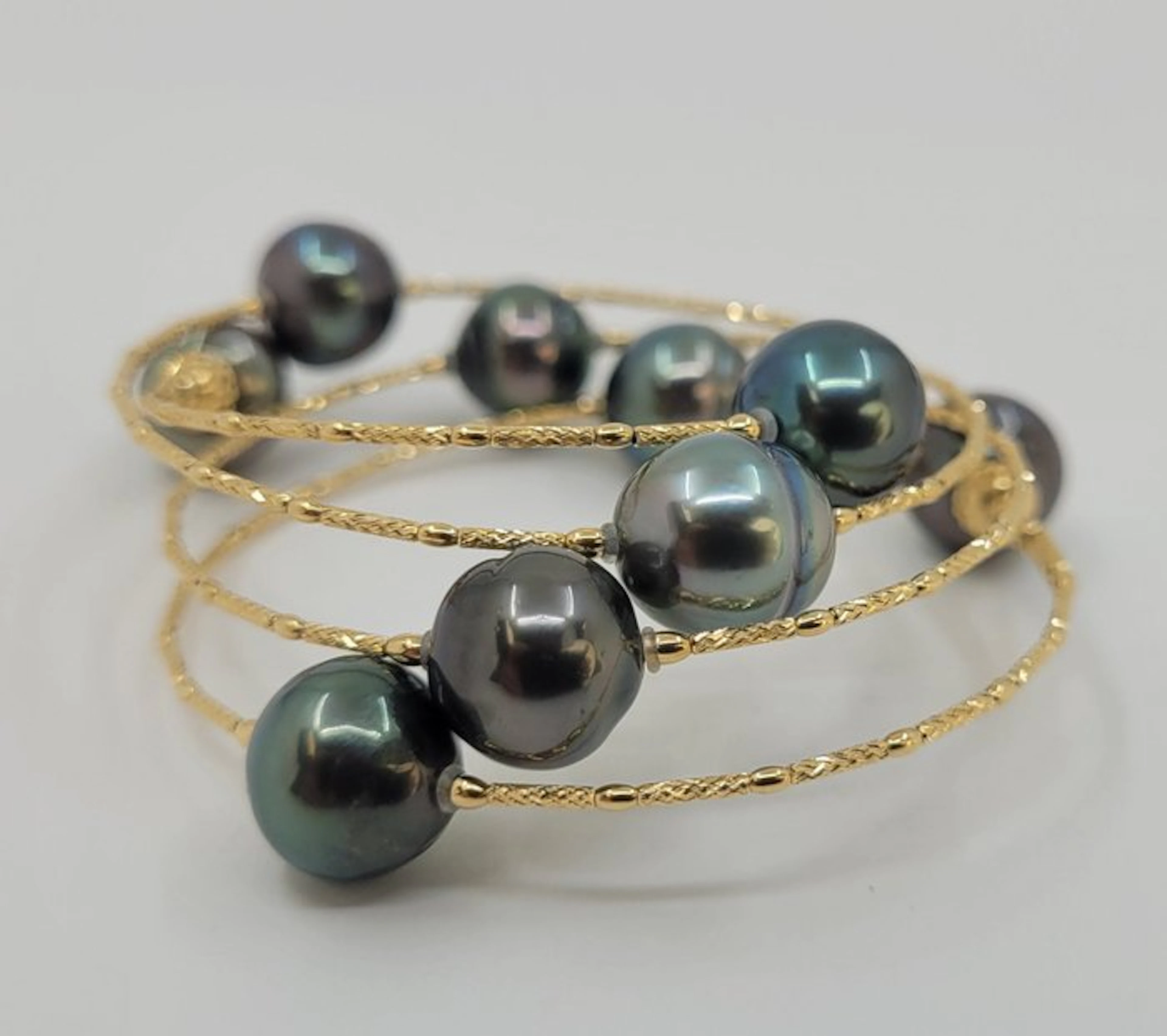 Bracelet - 18 kt. Yellow gold, 10x11mm Peacock Green Tahiti Pearls