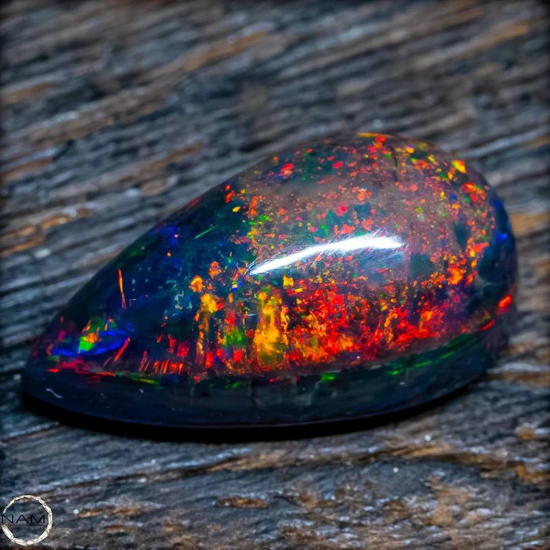 The finest Black Opal in glowing rainbow colors—a...