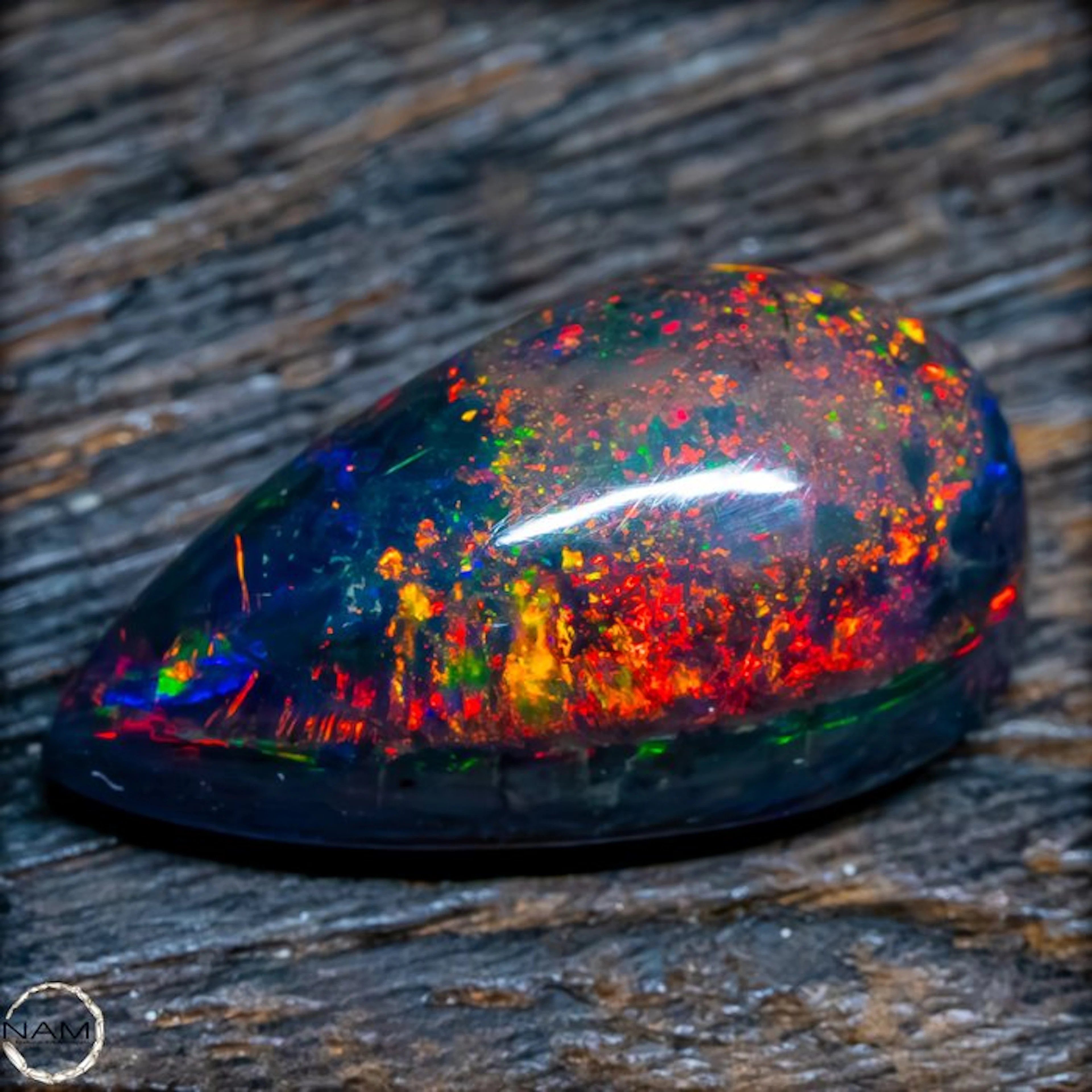 The finest Black Opal in glowing rainbow colors—a...