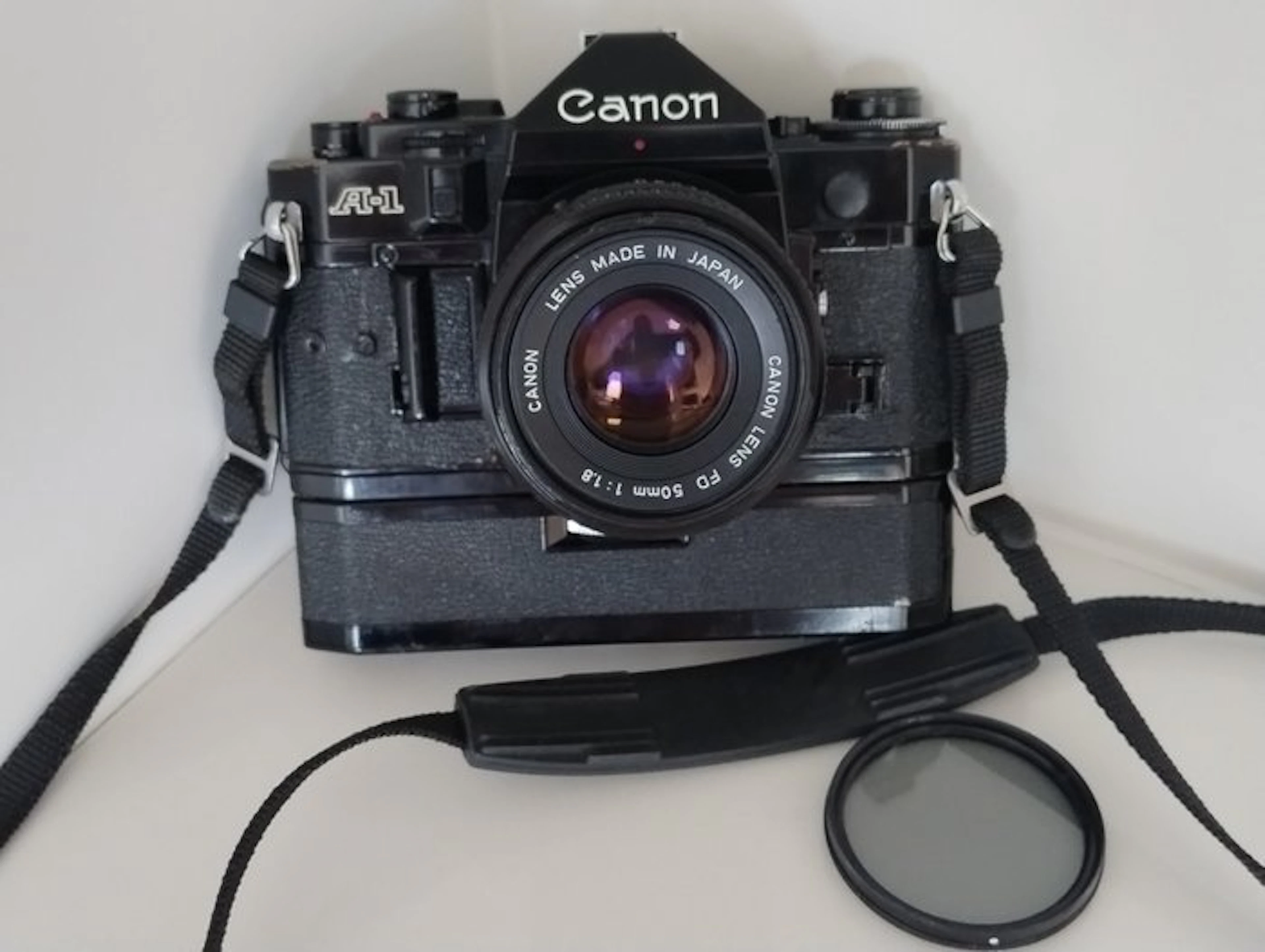 Canon A-01 + FD 50mm 1:1.8 + Power Winder A Single lens reflex camera (SLR)