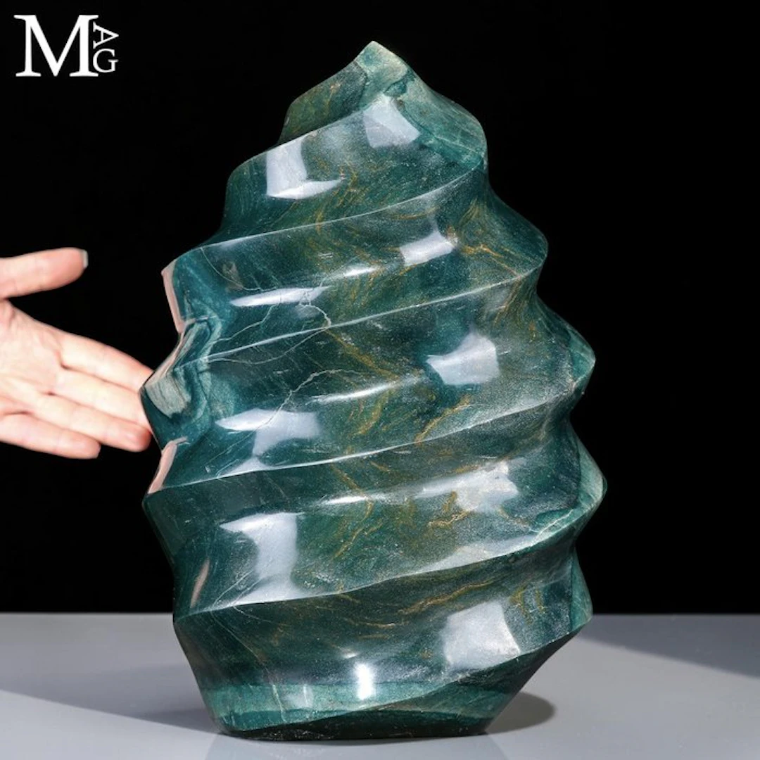Impressive flame sculpture in green jasper from...