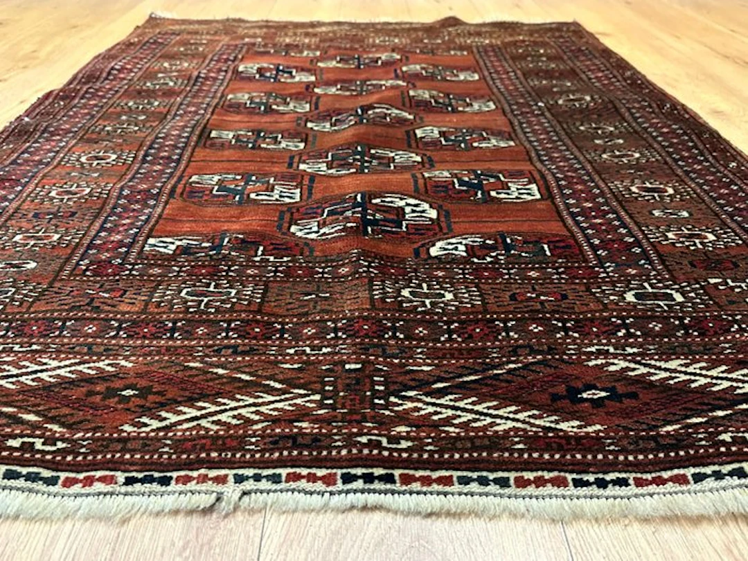 Hand-knotted Bukhara Jommut rug in the classic Turkmen...