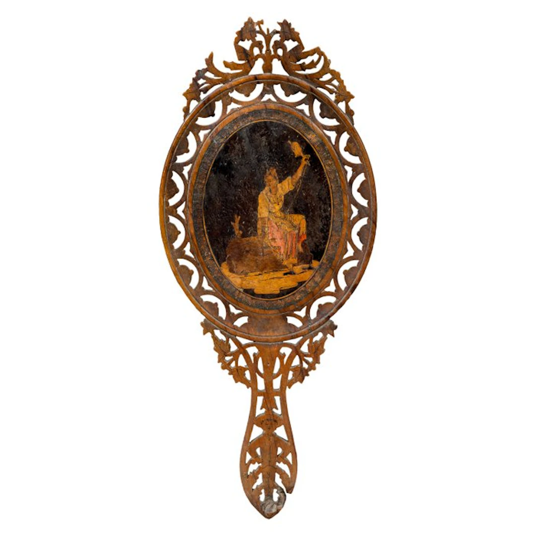 Hand mirror in carved