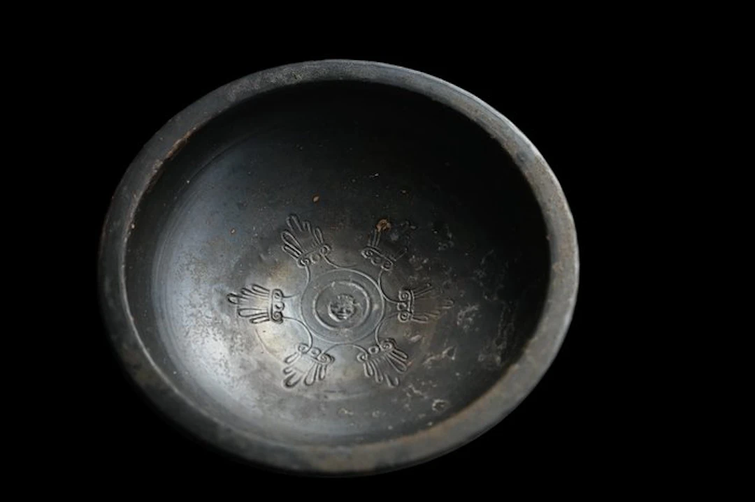Ancient Greek Terracotta Campanian black glazed bowl with...