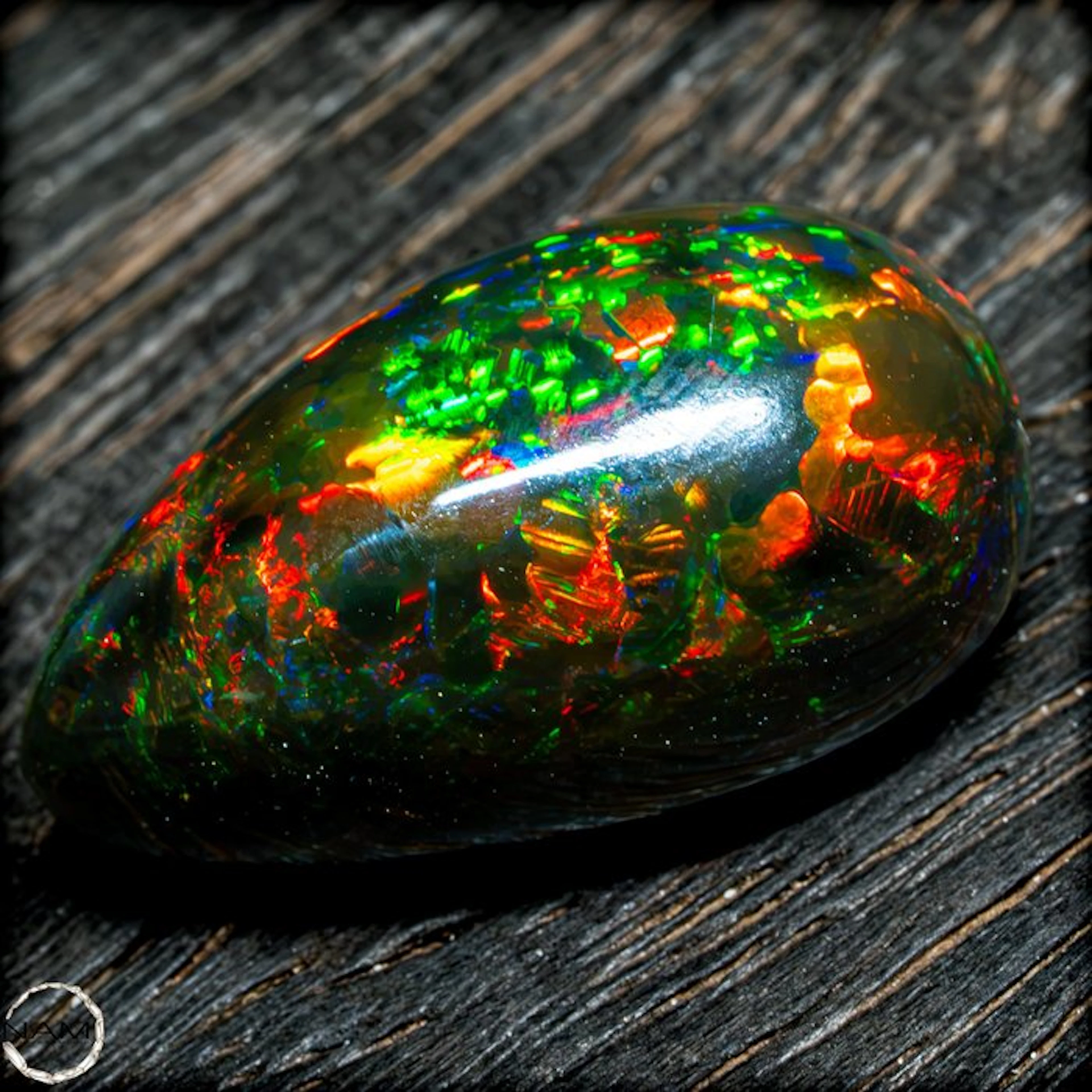 The finest Black Opal in glowing rainbow colors—a...