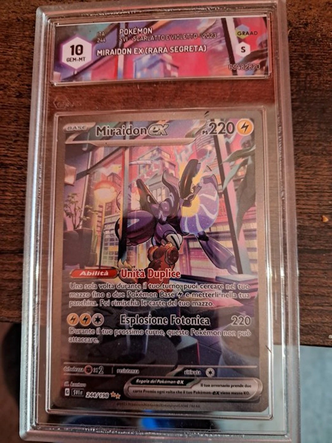 Pokémon - 1 Graded card - Miraidon ex 244/198 Secret rare