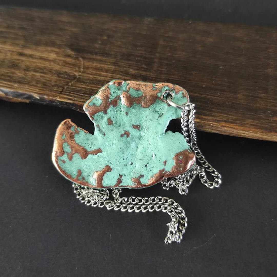 Copper splash with a silver chain Pendant - Height: 0.5...