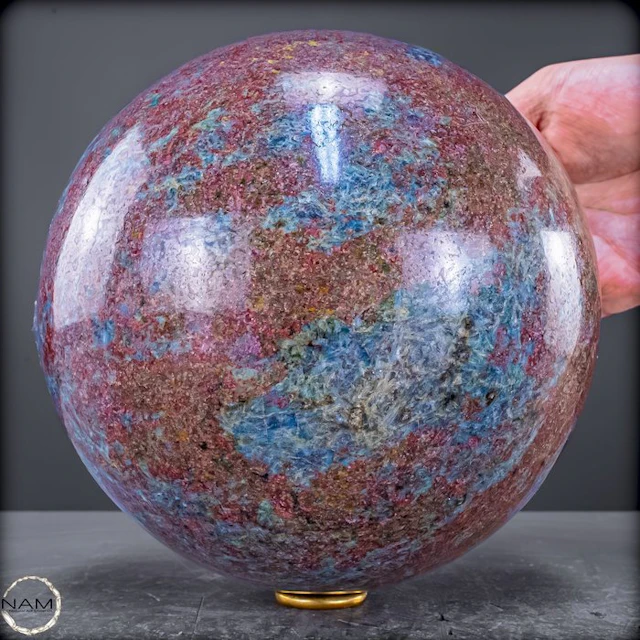 Exquisite ruby-kyanite-fuchsite sphere – a harmonious...