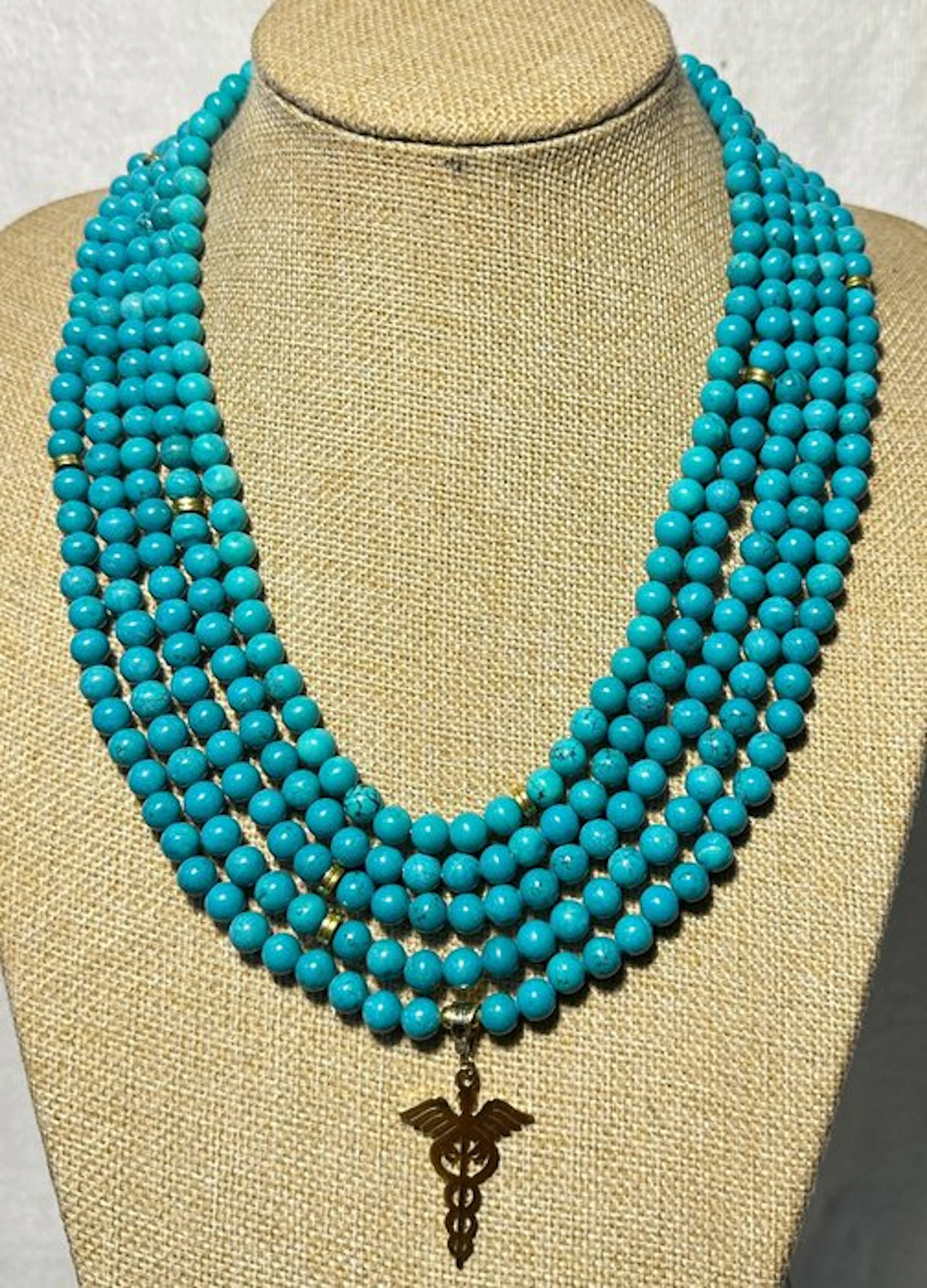 Stabilized Turquoise and Mother-of-Pearl with medical pendant 'Health'