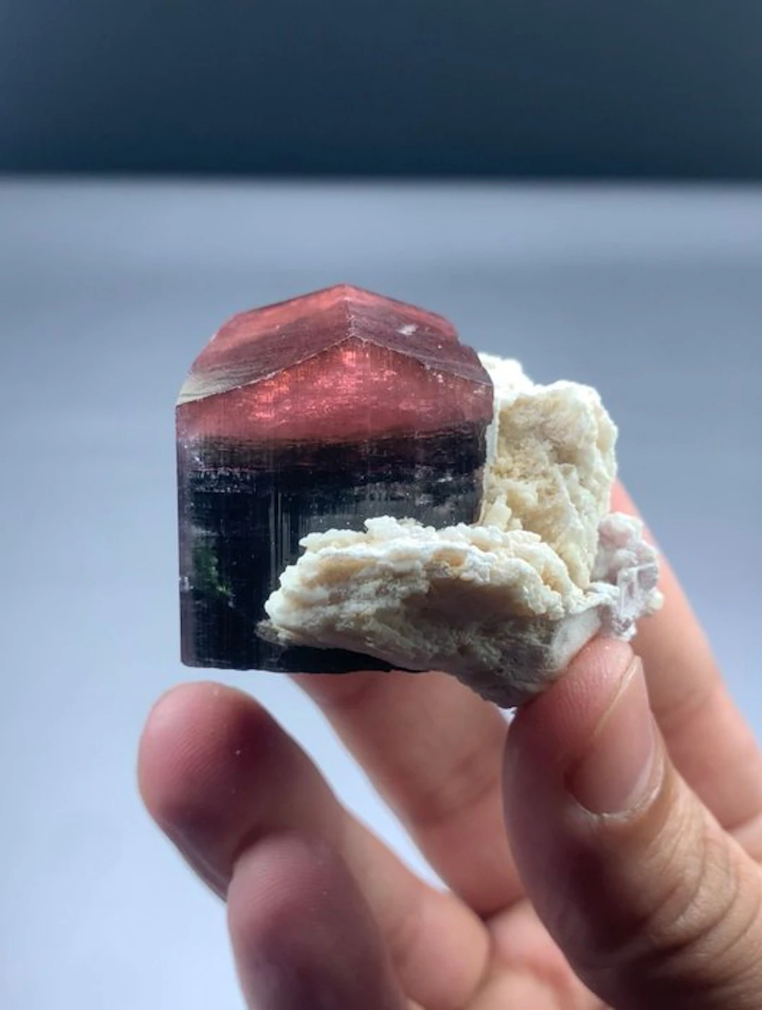 Bicolour tourmaline combine with feldspar and quartz...