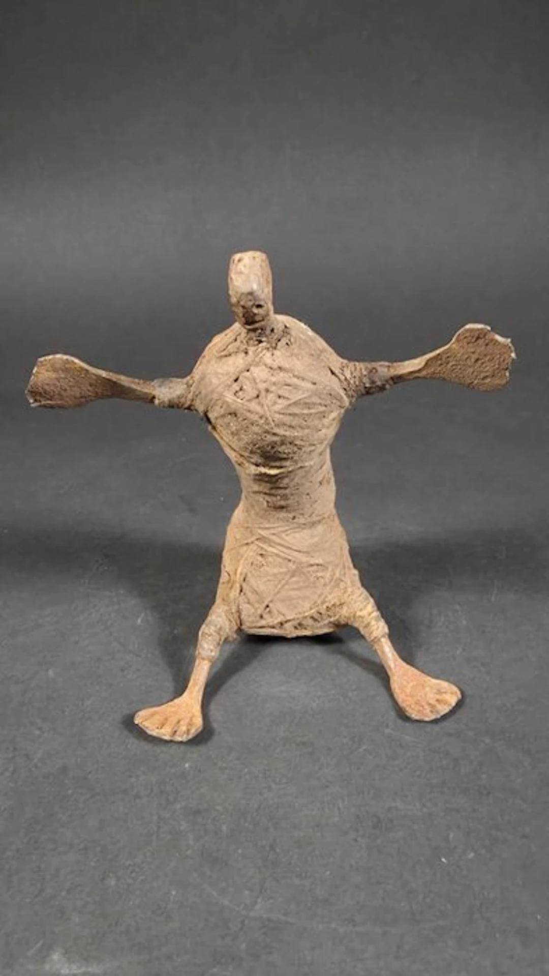Doll made of wrought iron and woolen cloth