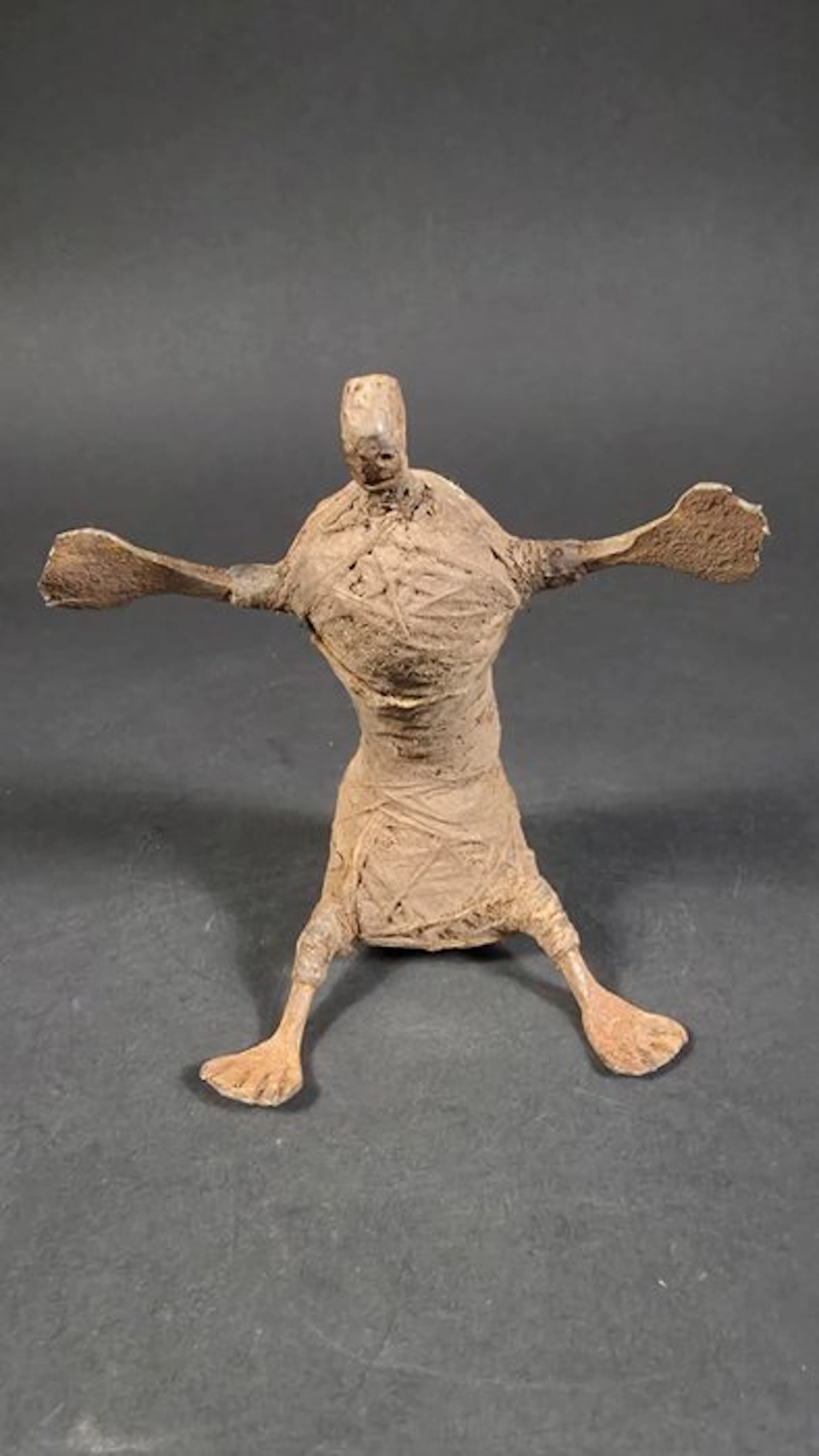 Doll made of wrought iron and woolen cloth