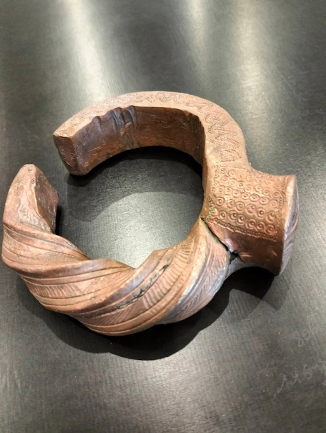 Remarkable twisted-coin bracelet