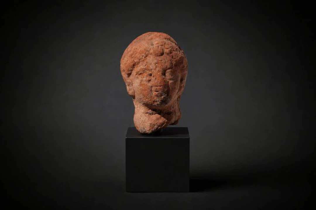 Ancient Greek terracotta female head - 4 cm