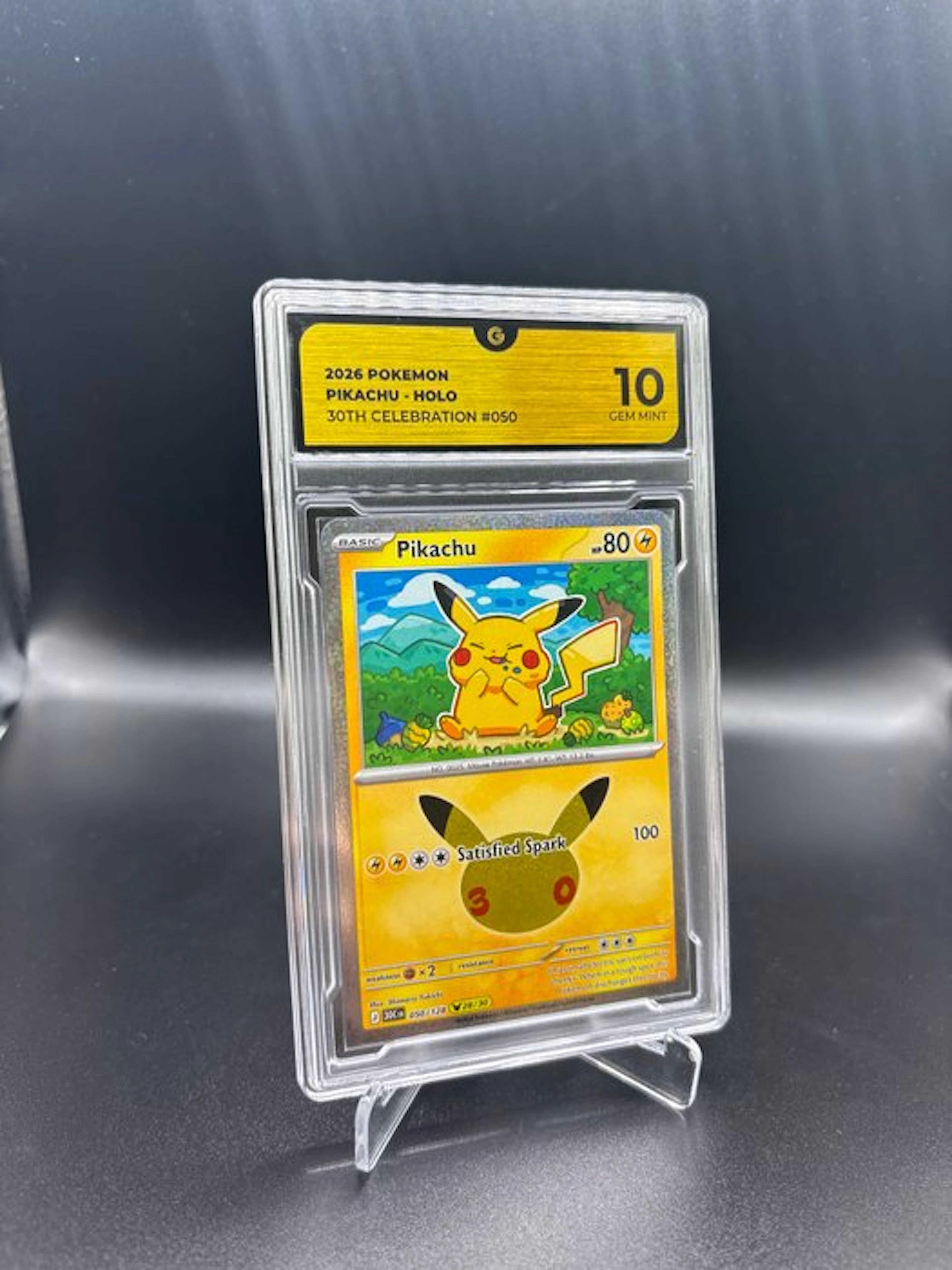 Pokémon - 1 Graded card - Pikachu 050 30TH Anniversary Holo - GG 10
