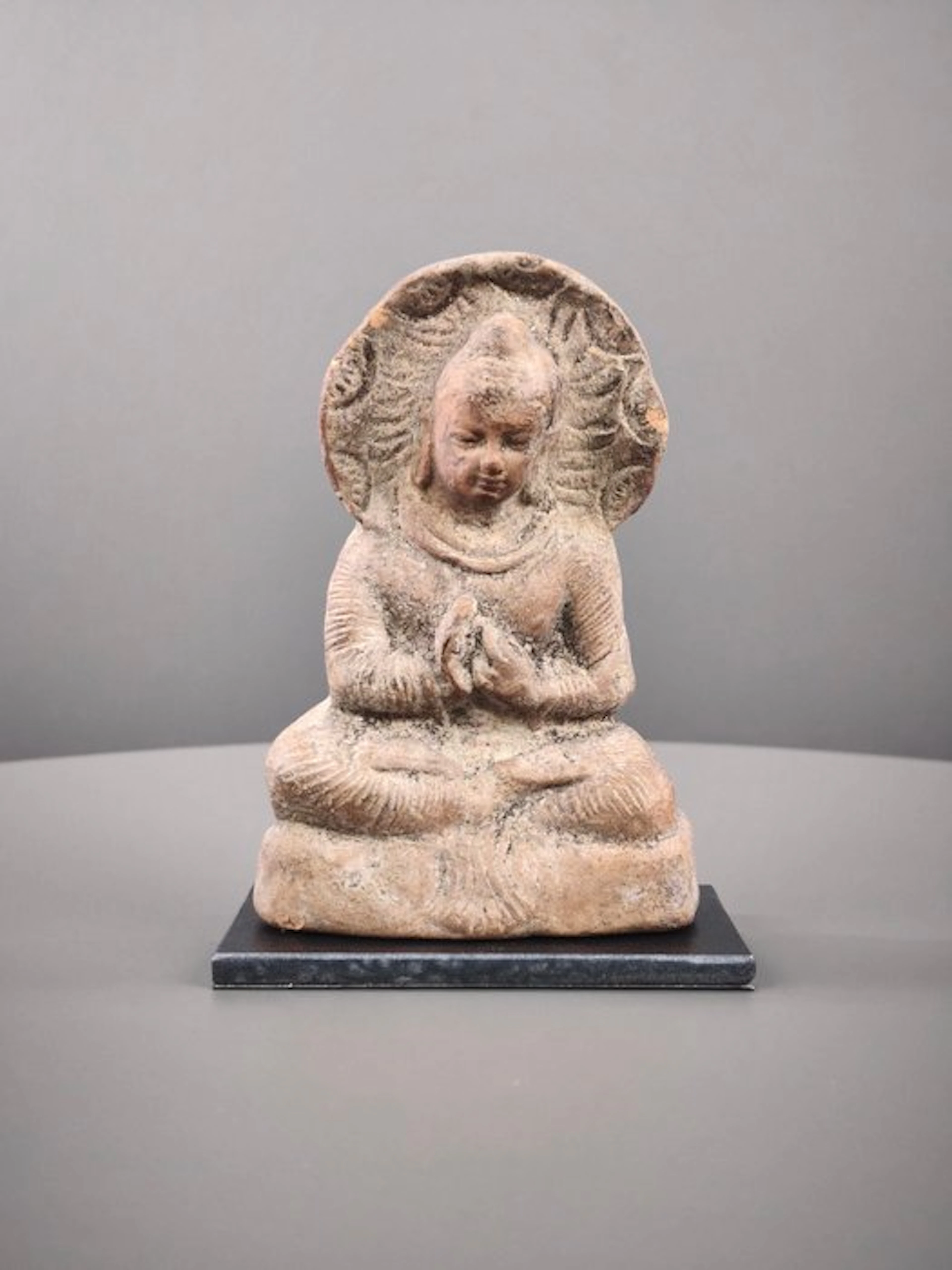 Northern India Terracotta Buddha seated in the Dharmachakra Mudra. - 13 cm