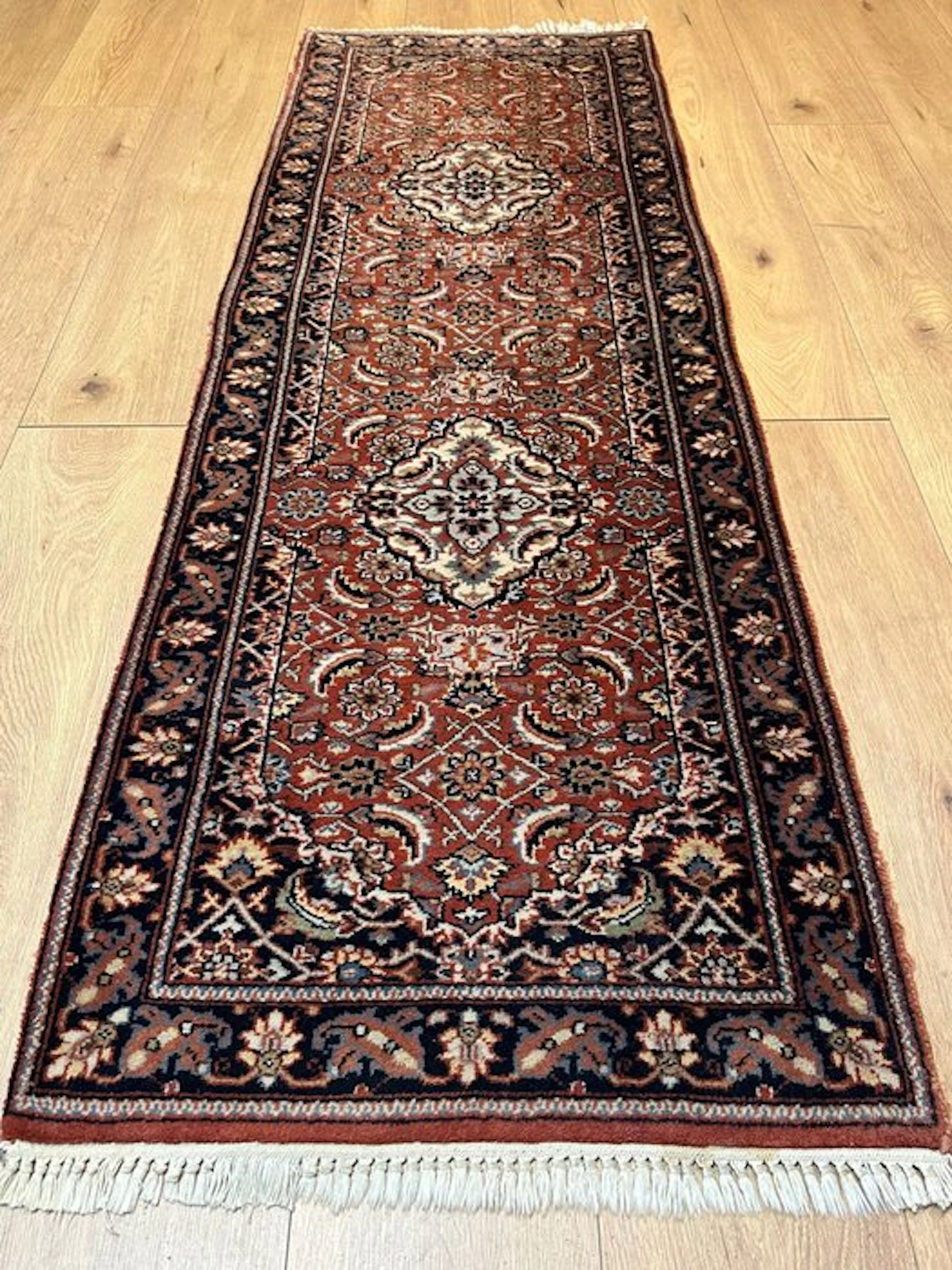 Hand-knotted Indian Bidjar runner with a classic...