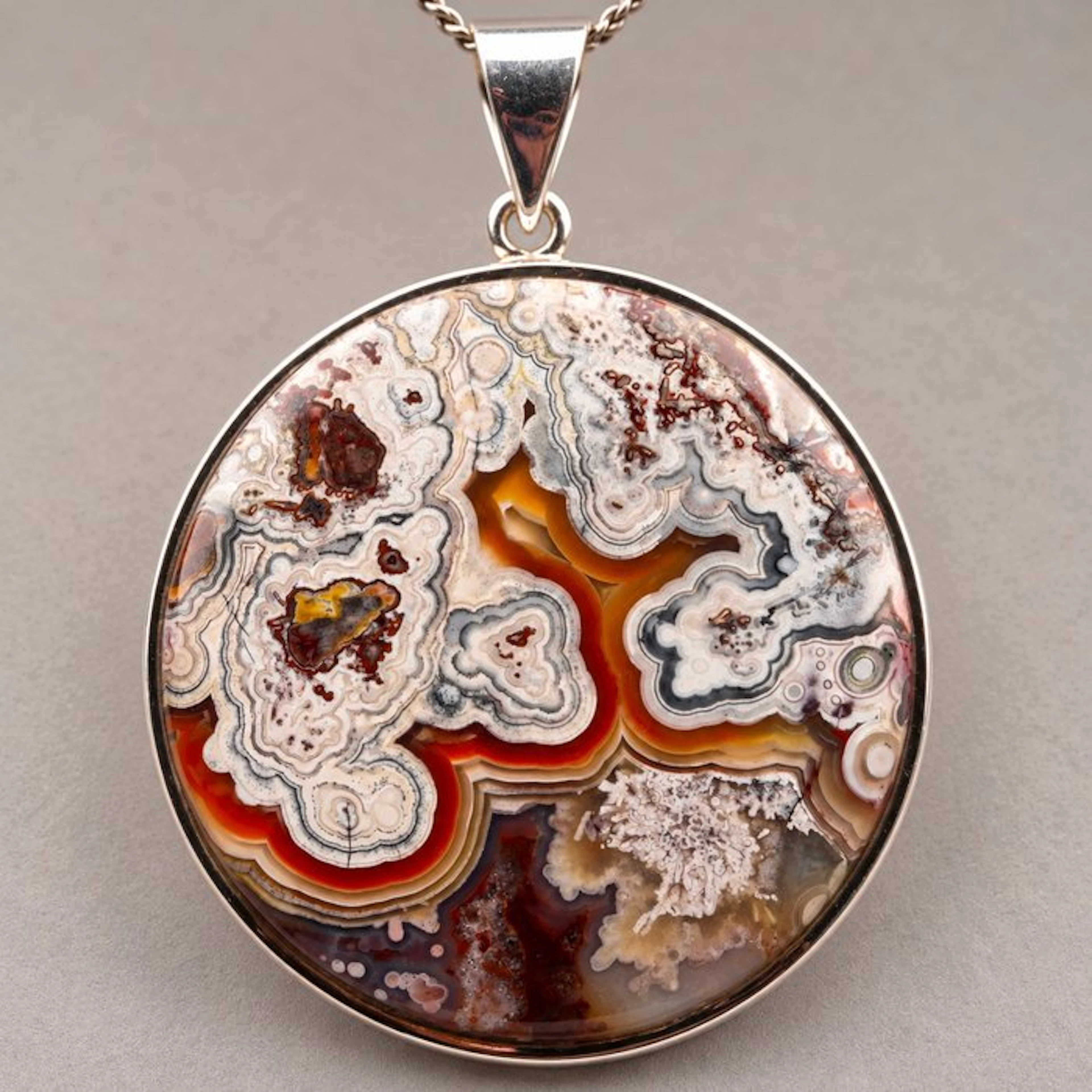 Crazy Lace Agate pendant from Mexico – Elegant cabochon in 925 sterling silver
