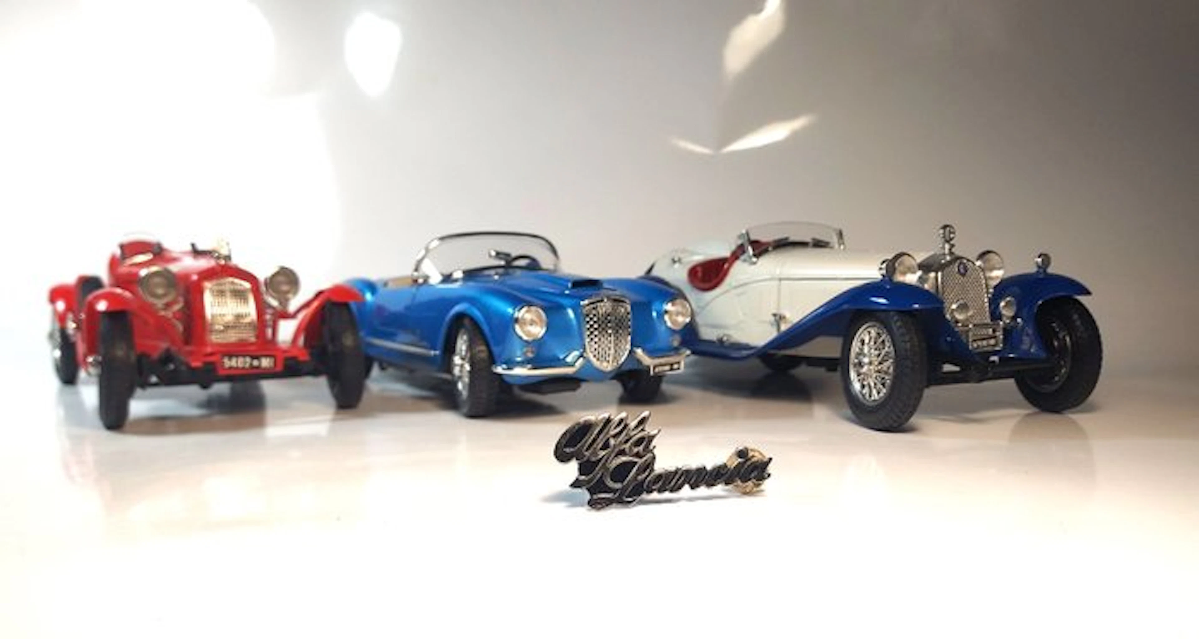 Bburago 1:18 - Model car (4) - 3x Alfa Romeo/Lancia cars...