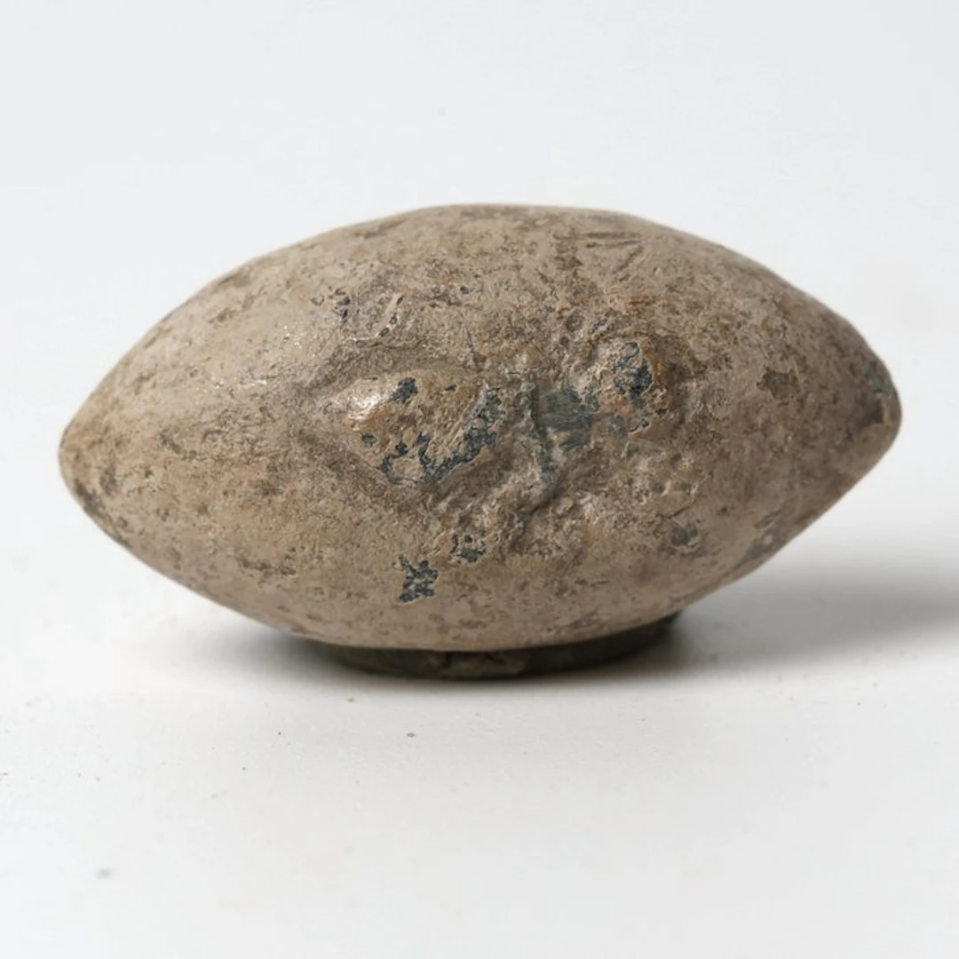 Ancient Greek Lead Sling bullet with Bee and inscription...