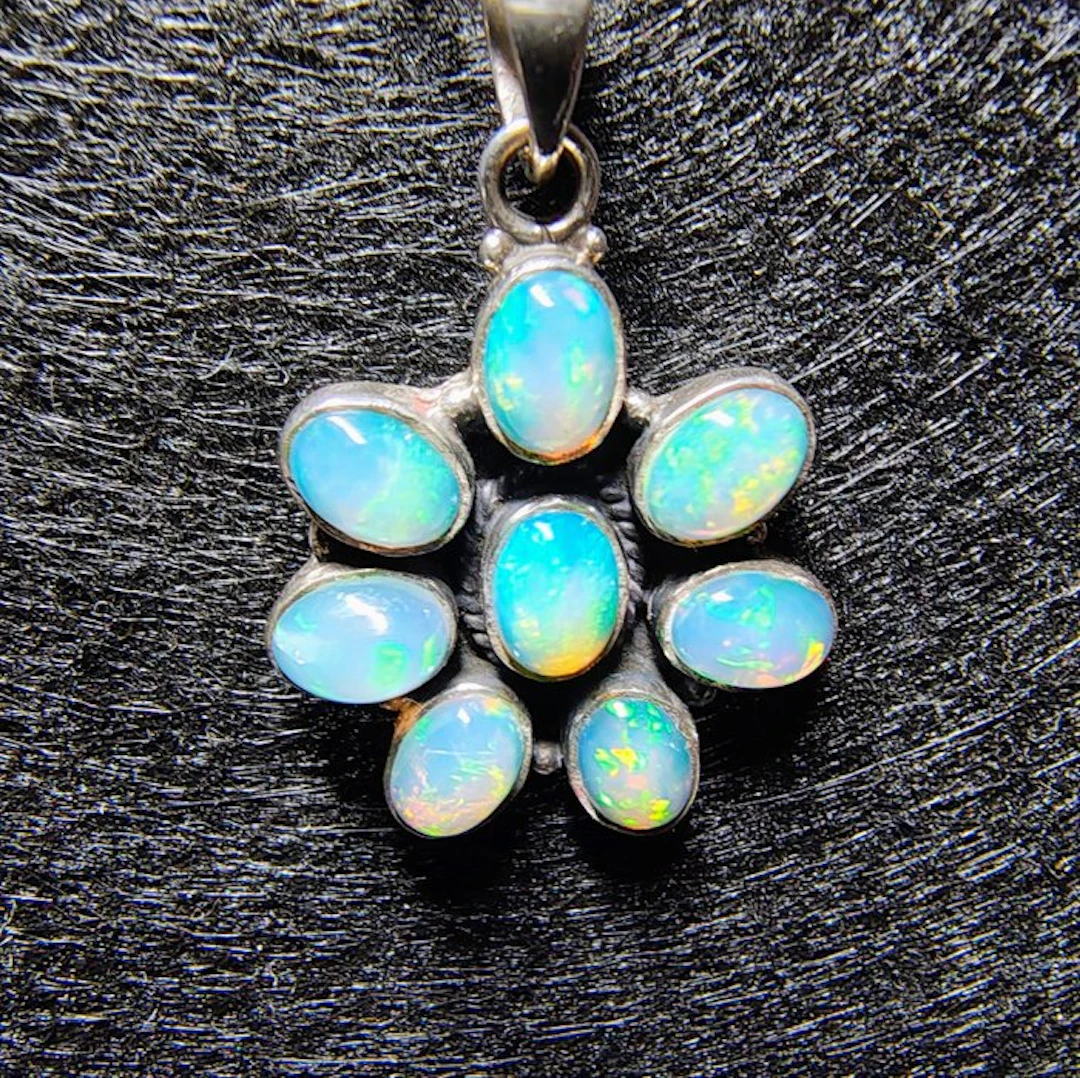 Sterling silver pendant with 8 natural untreated opals –...