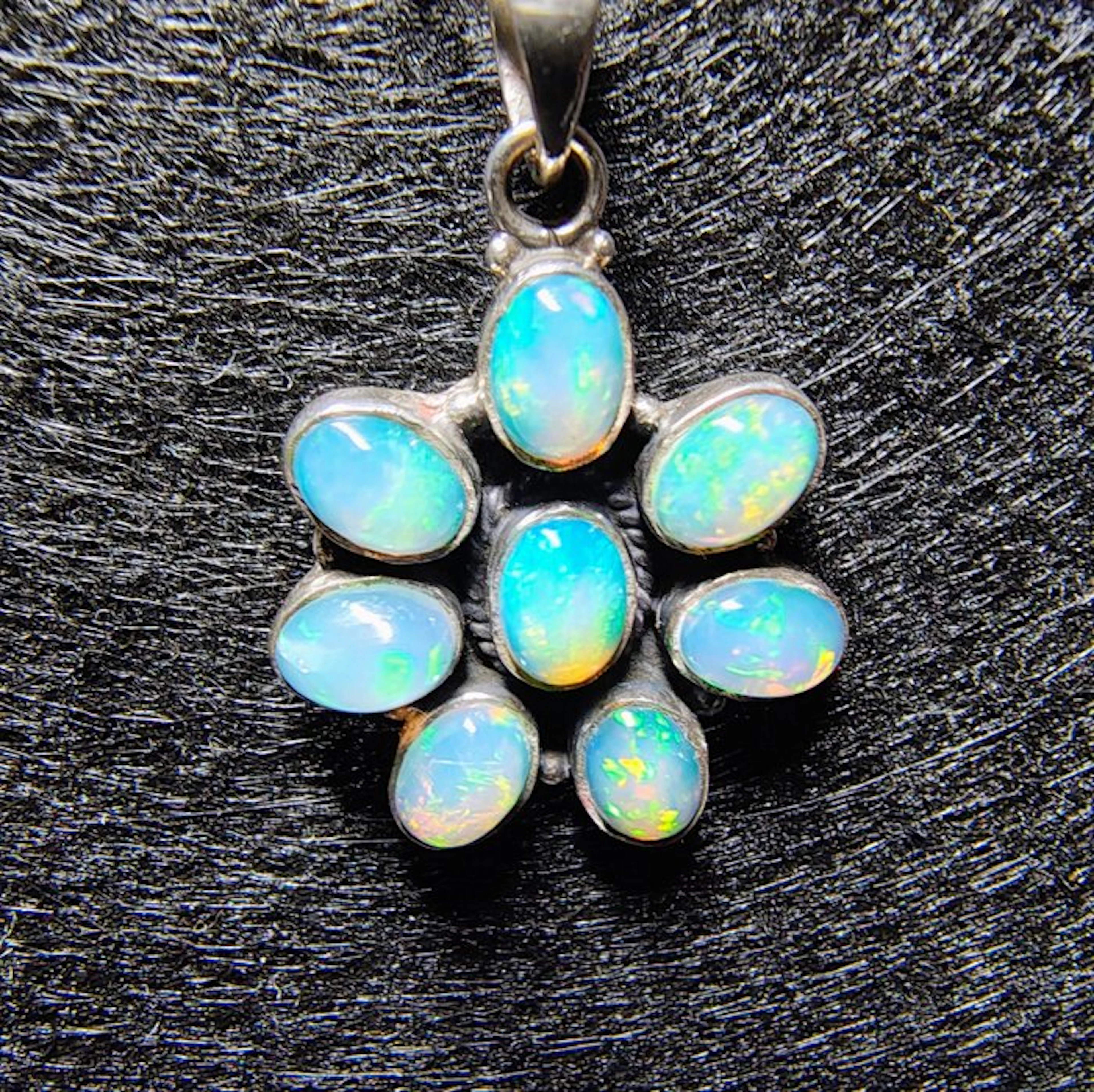 Sterling silver pendant with 8 natural untreated opals –...
