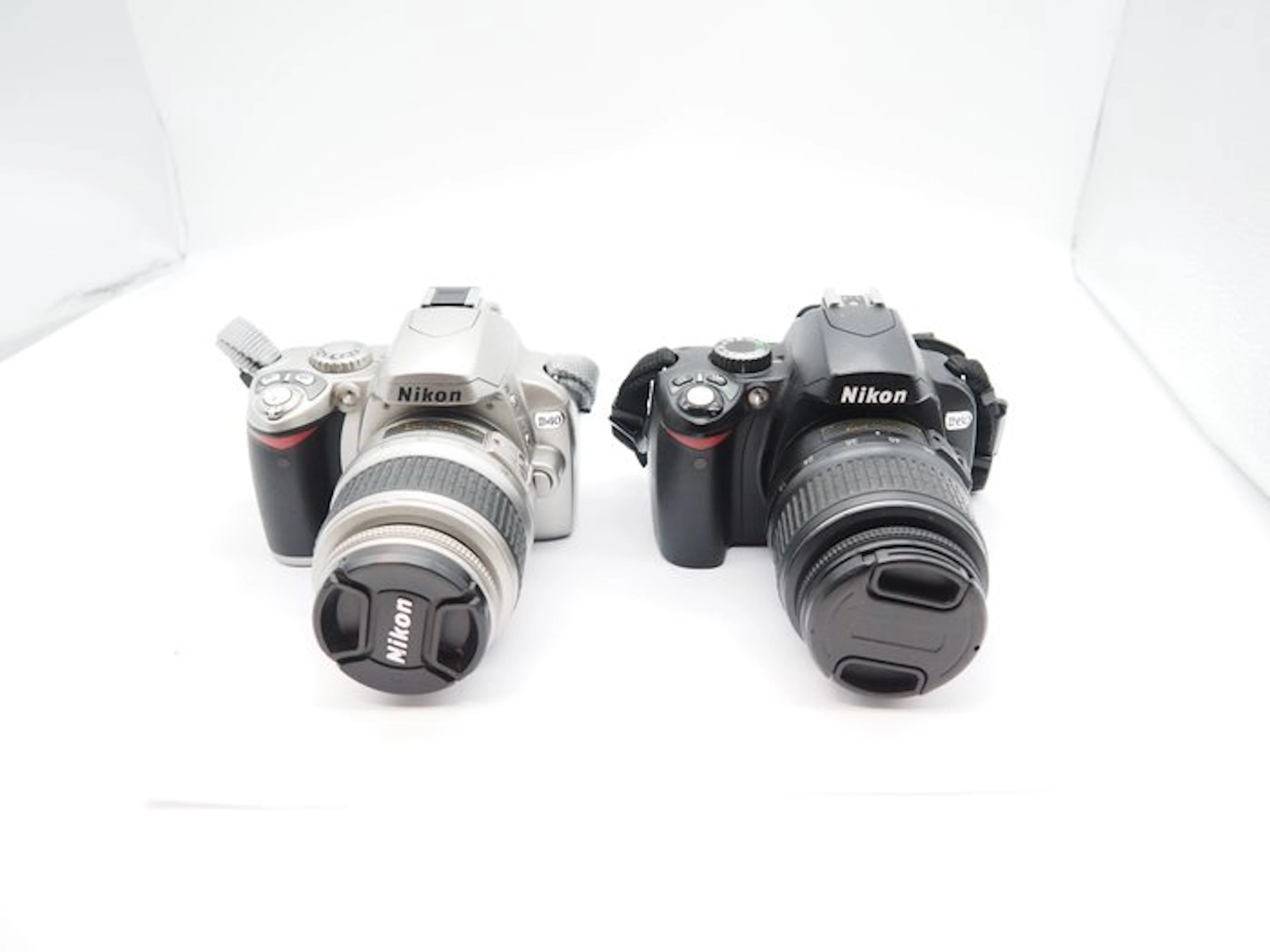 Nikon D40 camera + 18-55mm lens + D60 camera + 18-55mm...
