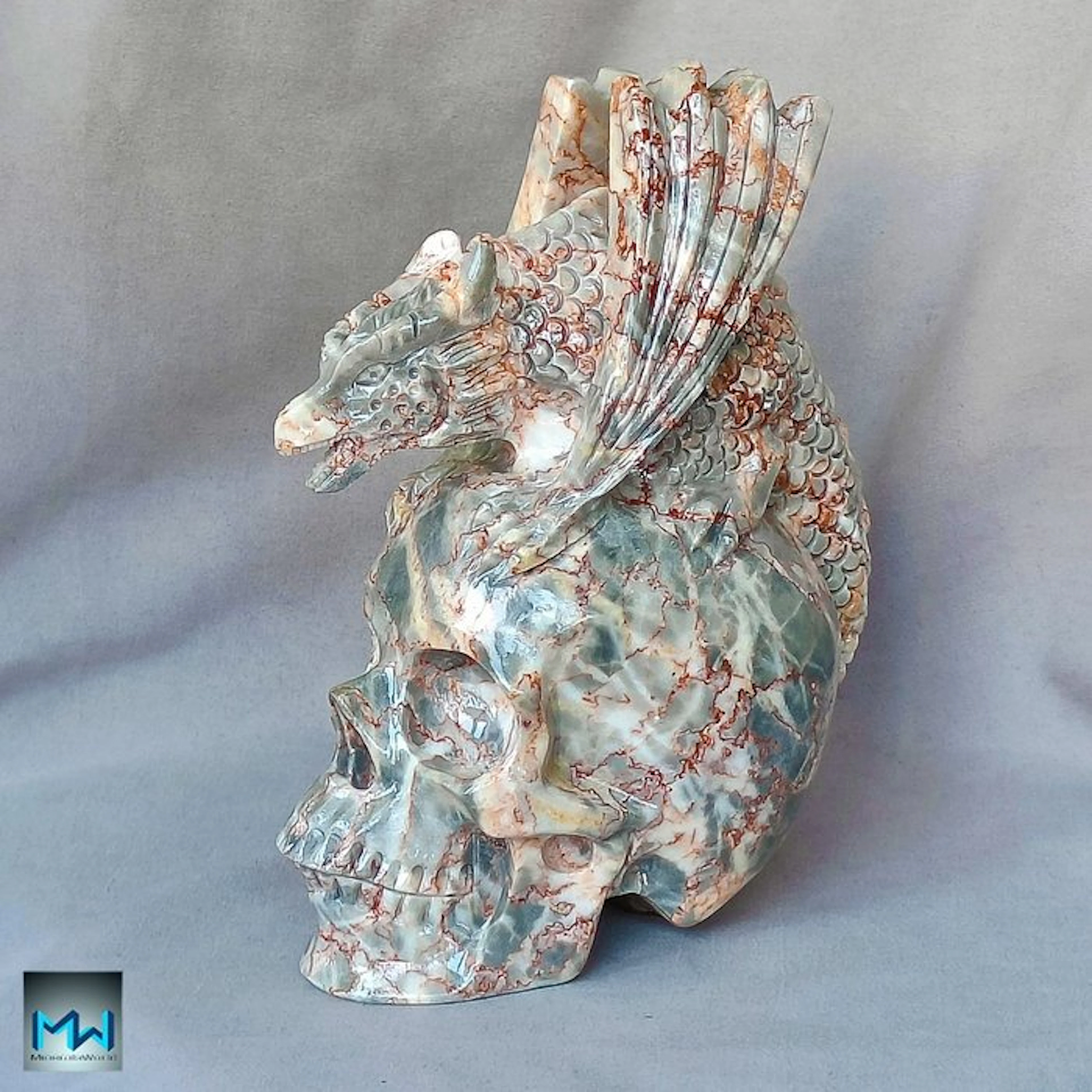 Dragon sculpture on a human skull