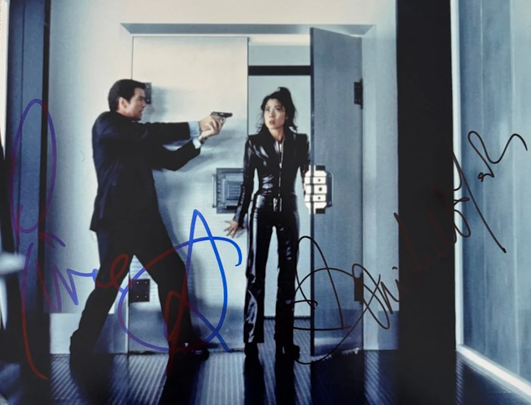 Tomorrow Never Dies - Double signed by Pierce Brosnan and...