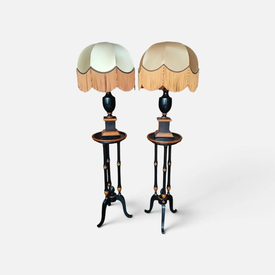 Pair of ebonized pillar black lacquered urn lamps...