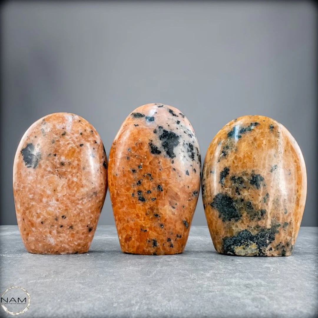 Orange calcite with black tourmaline – powerful harmony of light and protection