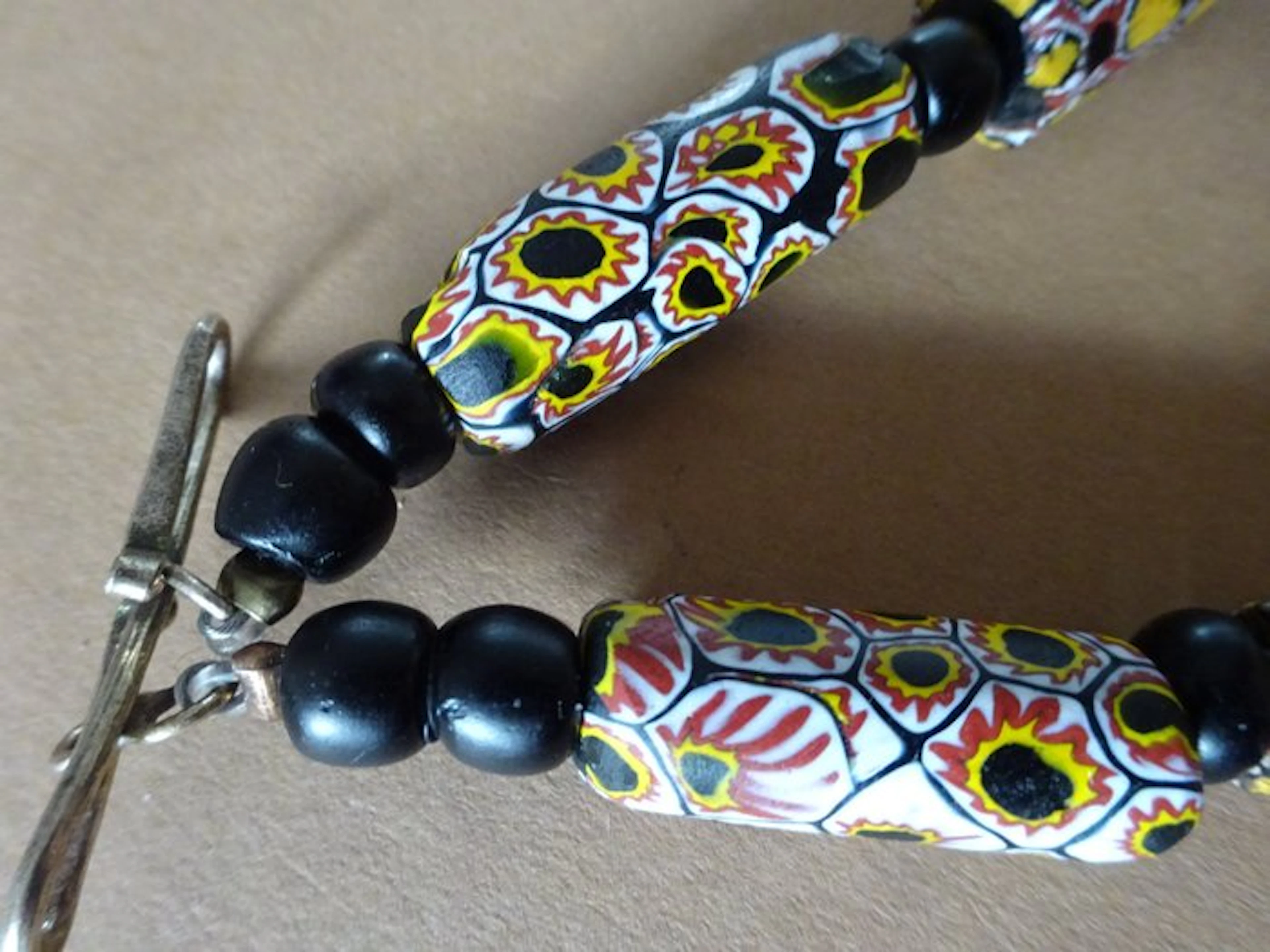 Necklace with 11 very large beads featuring a mosaic / millefiori motif