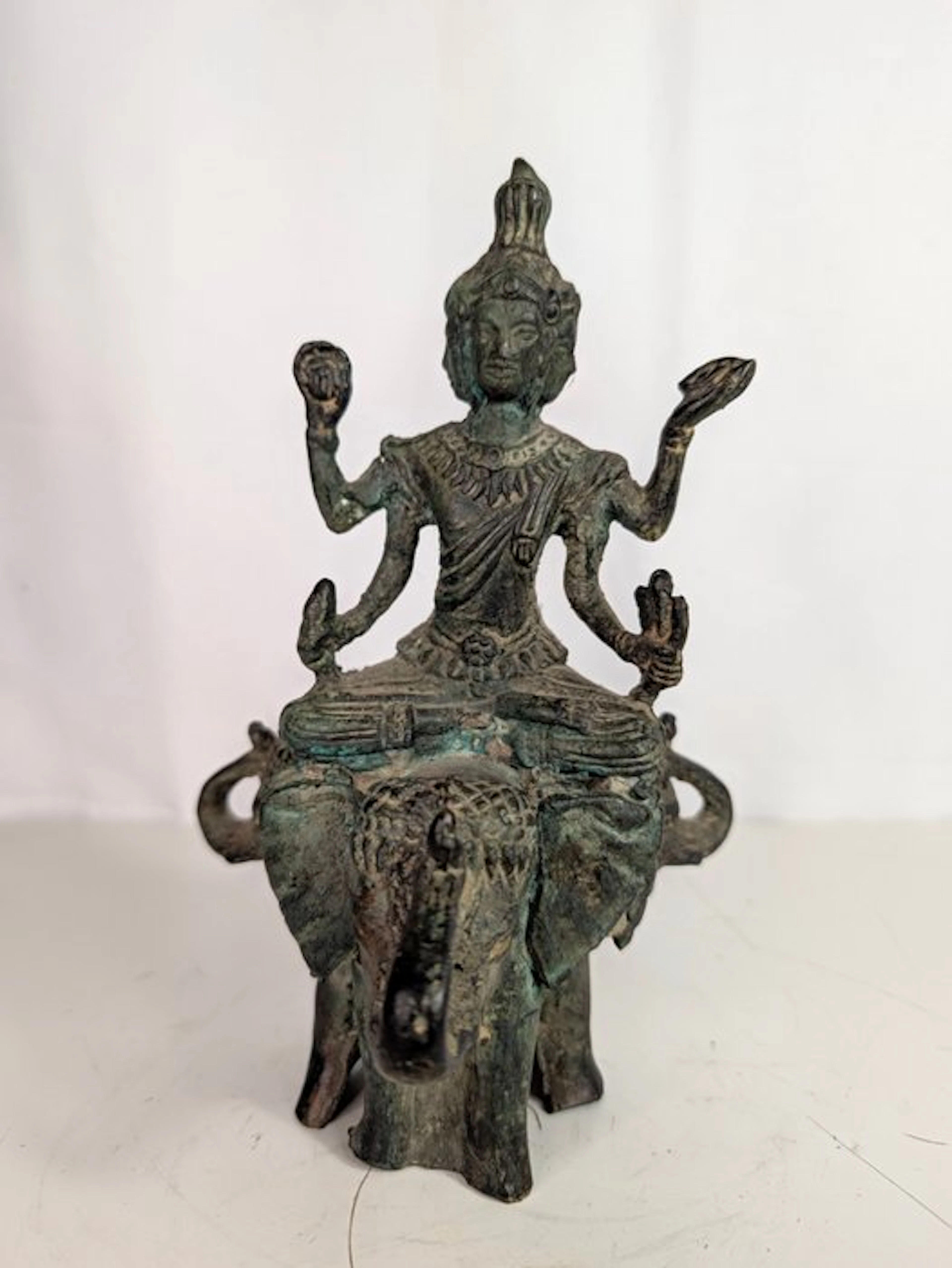 Indra (Phra In) on a three-headed elephant...