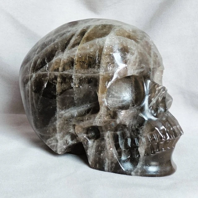 Hand-carved Skull Sculpture in Smoky Quartz Crystal...