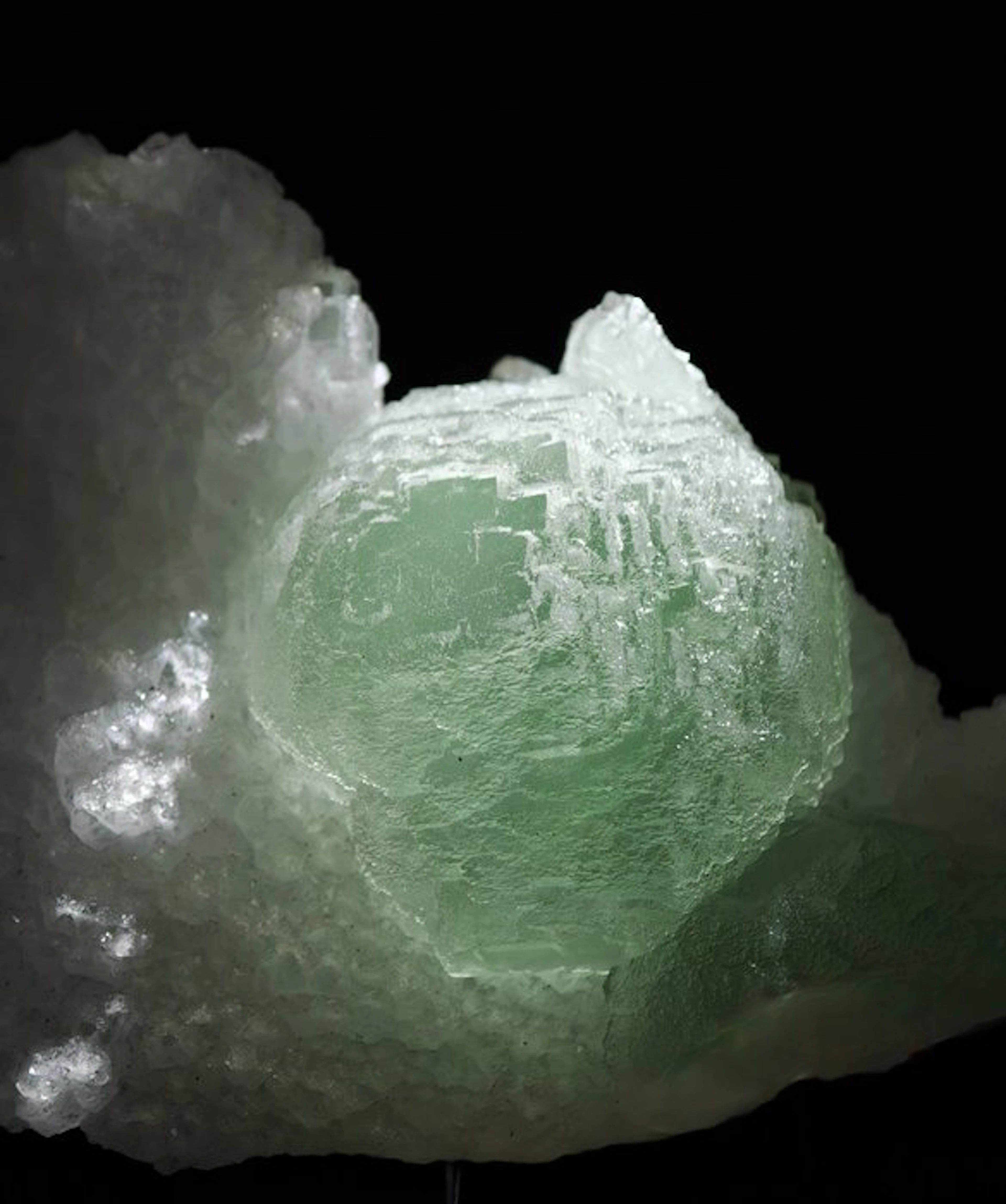 Green sugar-coated fluorite on quartz