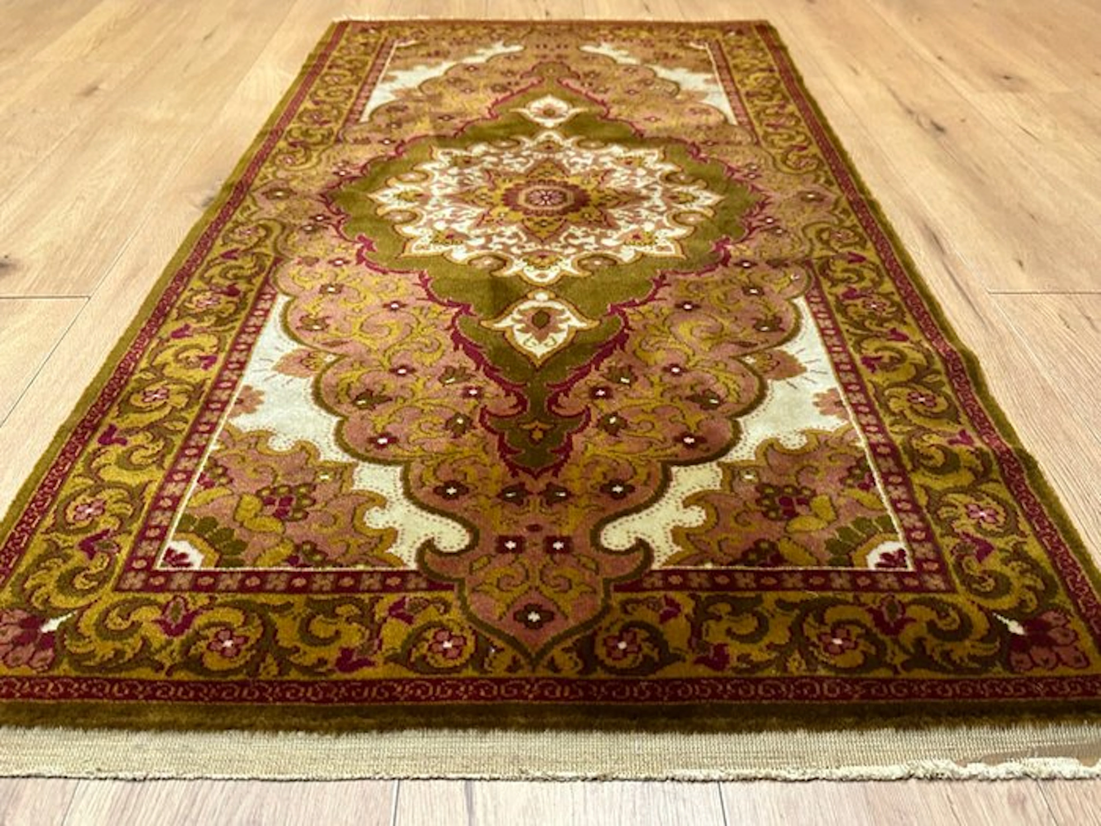 Kerman-style Oriental rug with a classic medallion...
