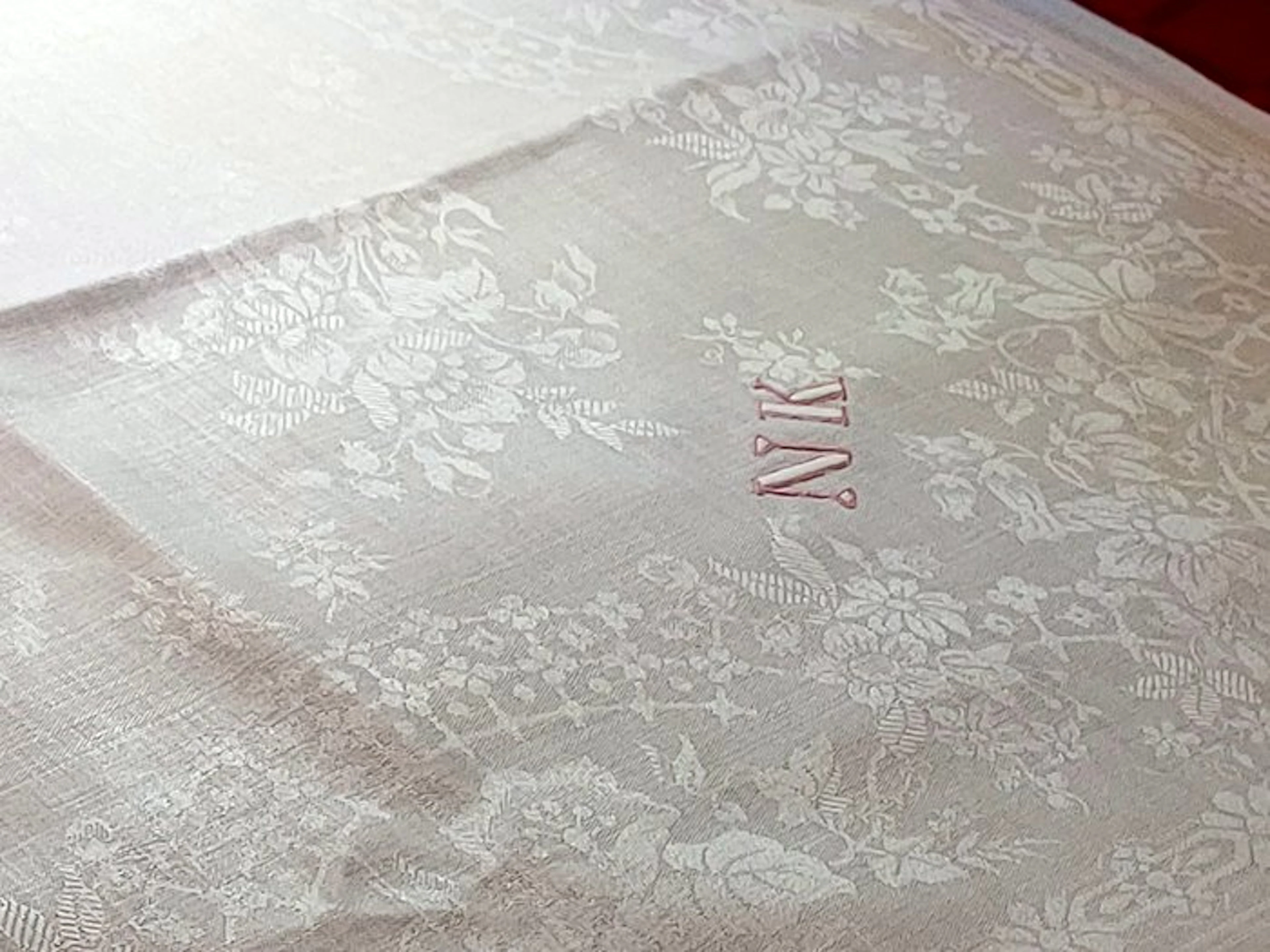 Napkin (9) - 93 cm - 76 cm - "NK" satin linen.