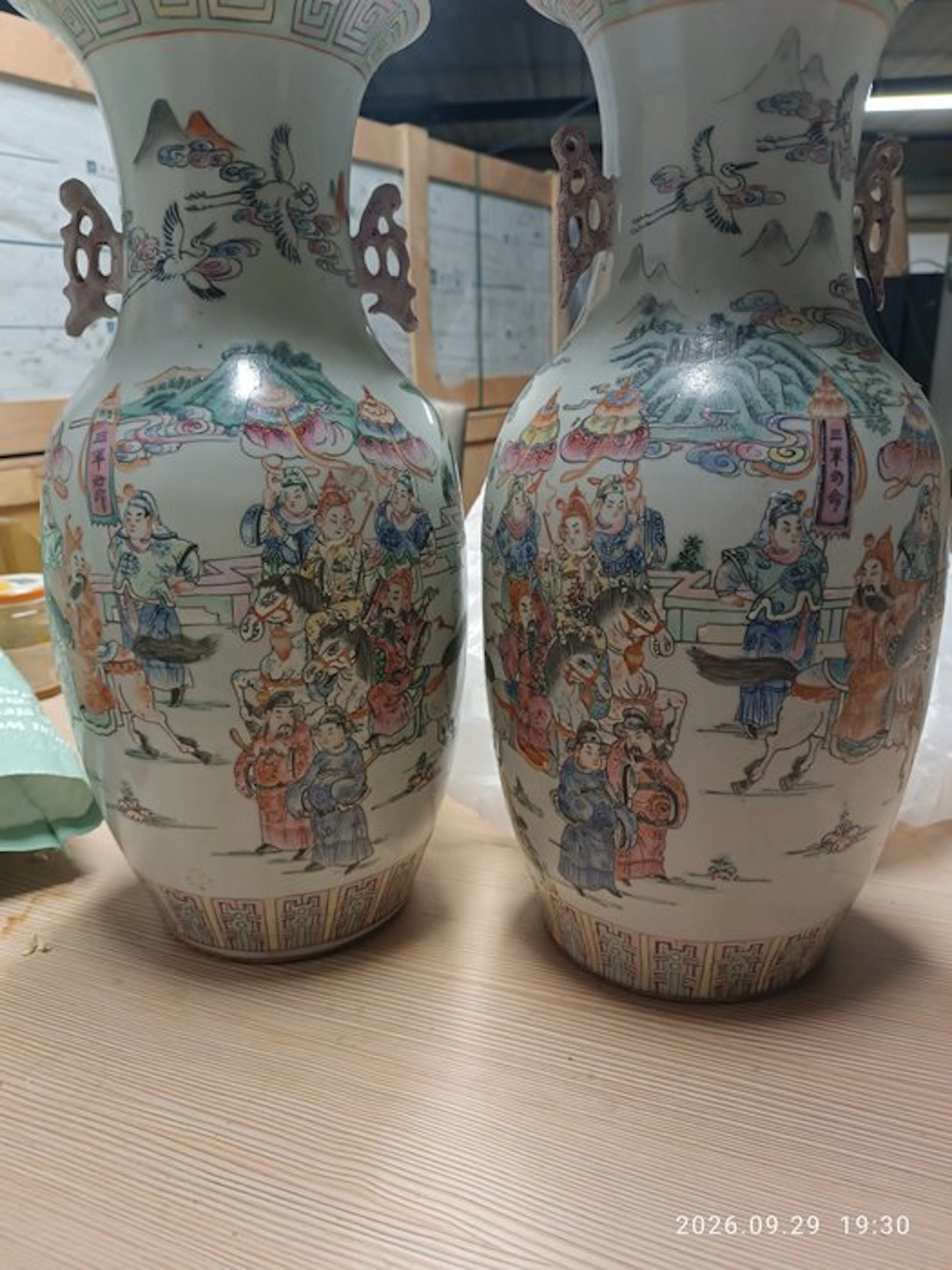 A pair of vases in the Famille Rose style
