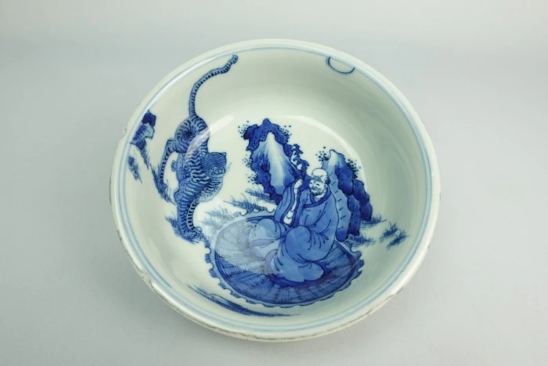Blue-and-White 'Taming the Tiger' Arhat Bowl - Porcelain...