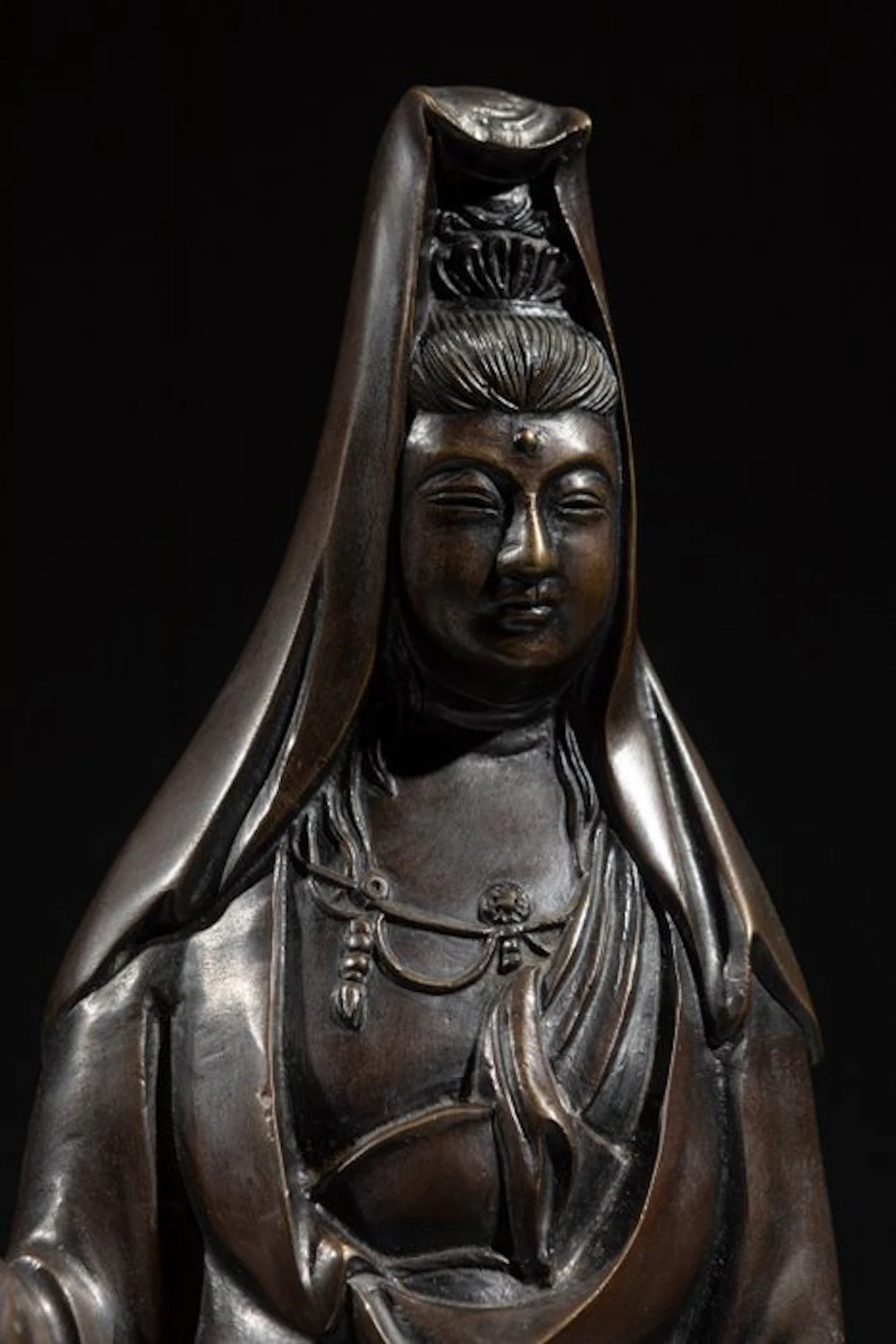 Bronze - A large bronze okimono of Kannon standing with...