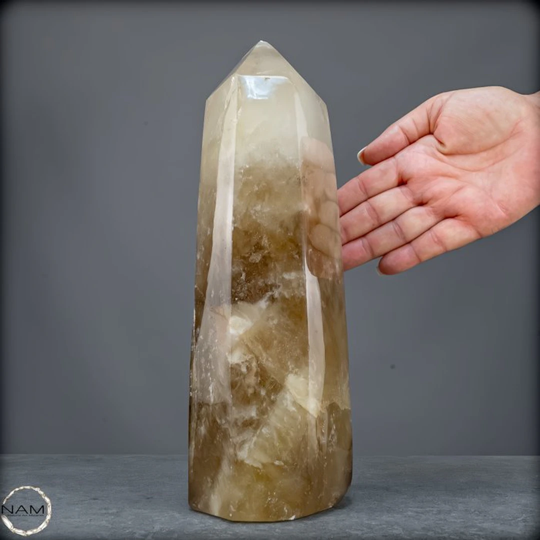 Natural smoky quartz obelisk – a striking structure with...