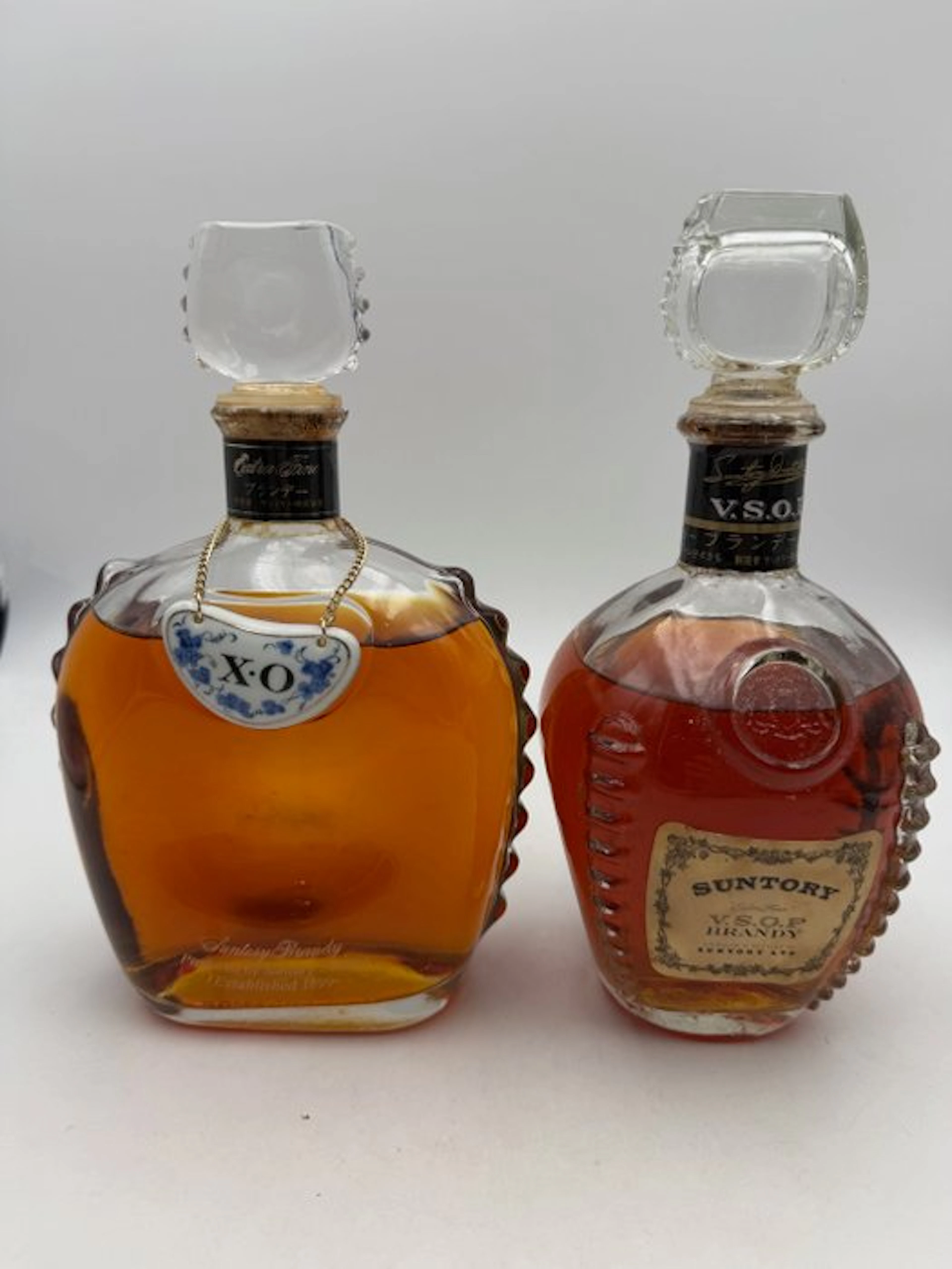 Suntory - Brandy XO + VSOP - b. 1980s, 1990s - 70cl, 72cl - 2 bottles