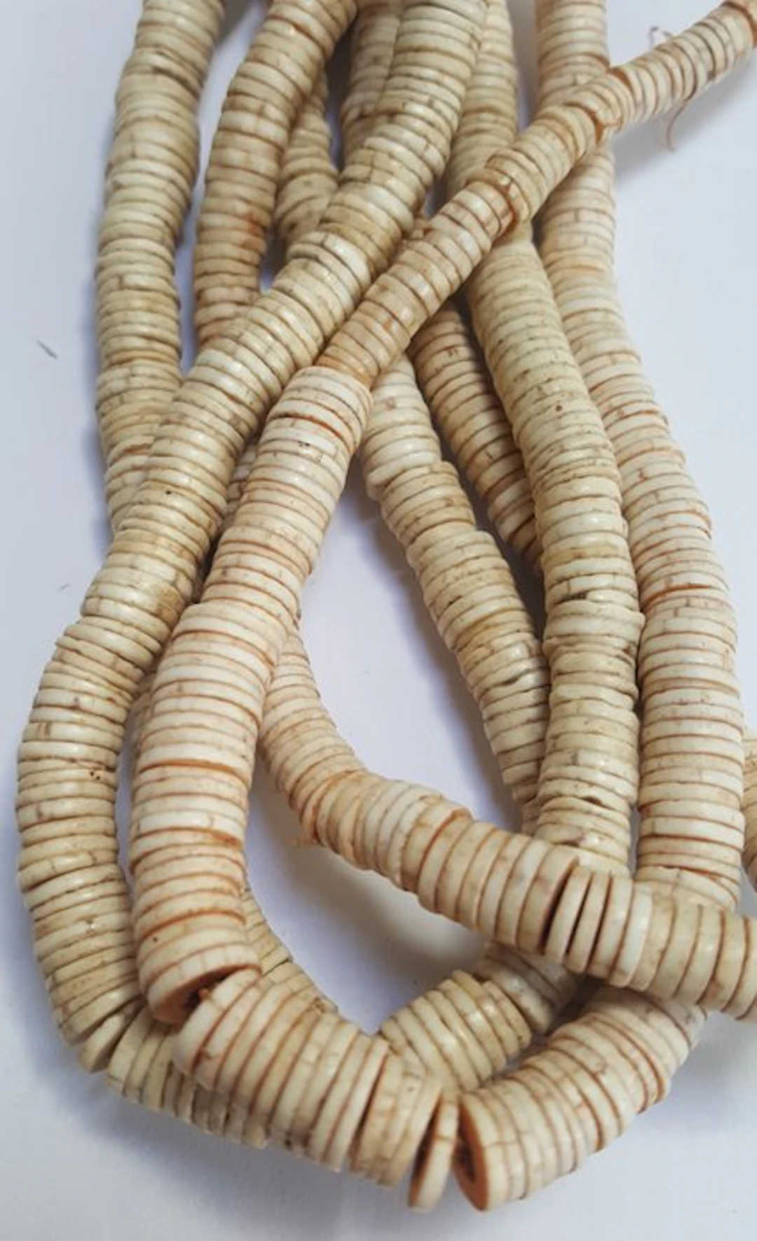 Necklaces (2) made from ostrich eggshell - heishi beads...