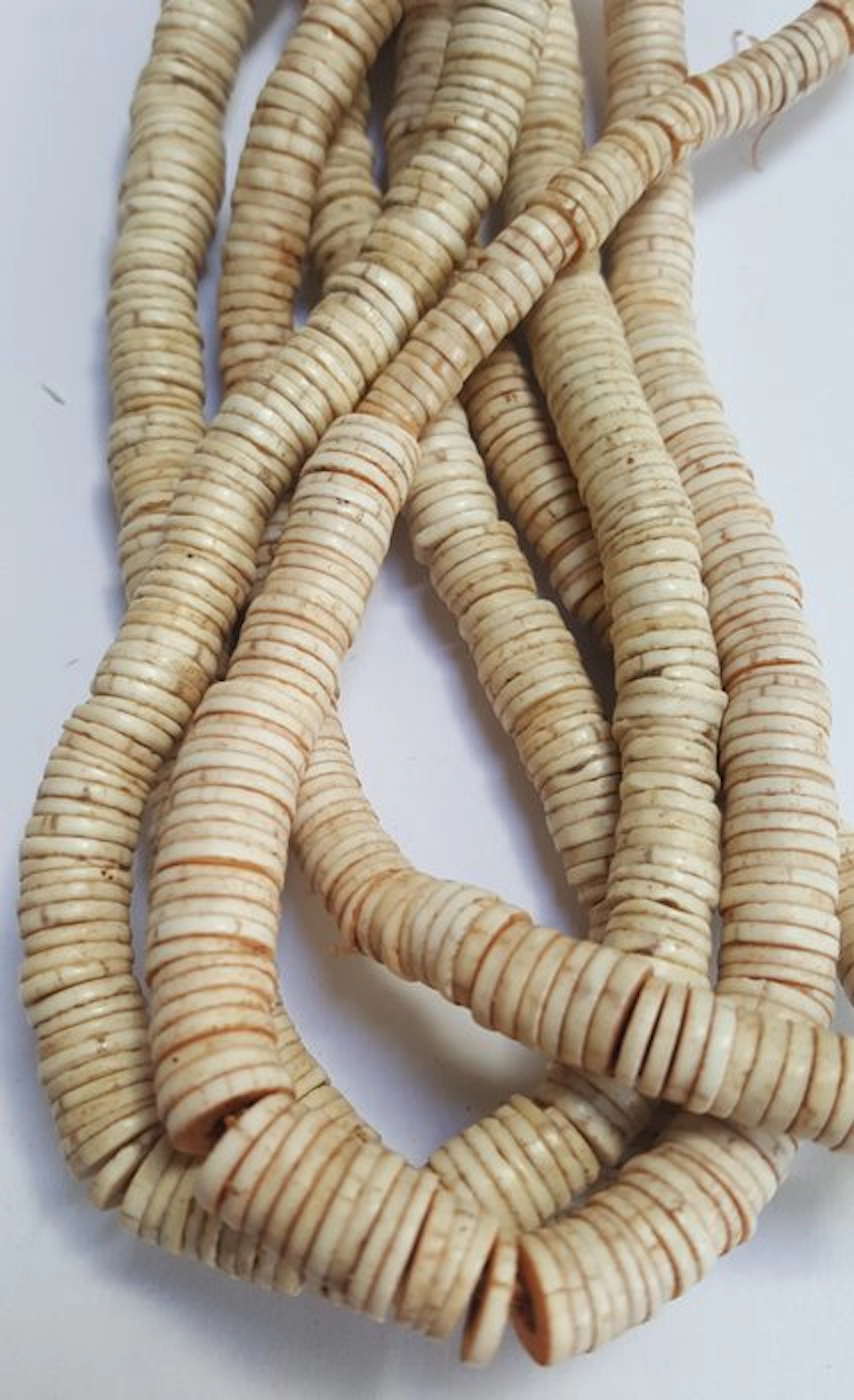 Necklaces (2) made from ostrich eggshell - heishi beads...