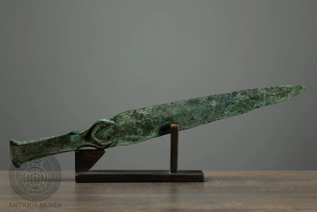 Western Asiatic Bronze Flanged-Hilt Dagger with...