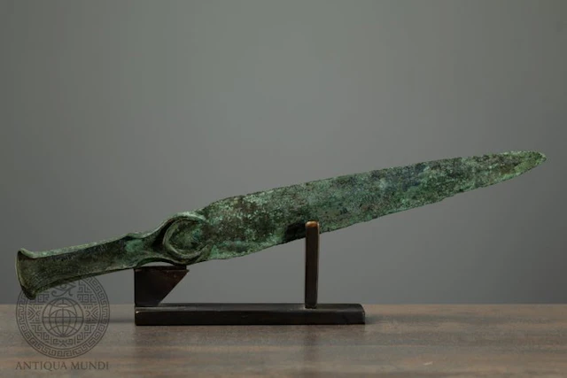 Western Asiatic Bronze Flanged-Hilt Dagger with...