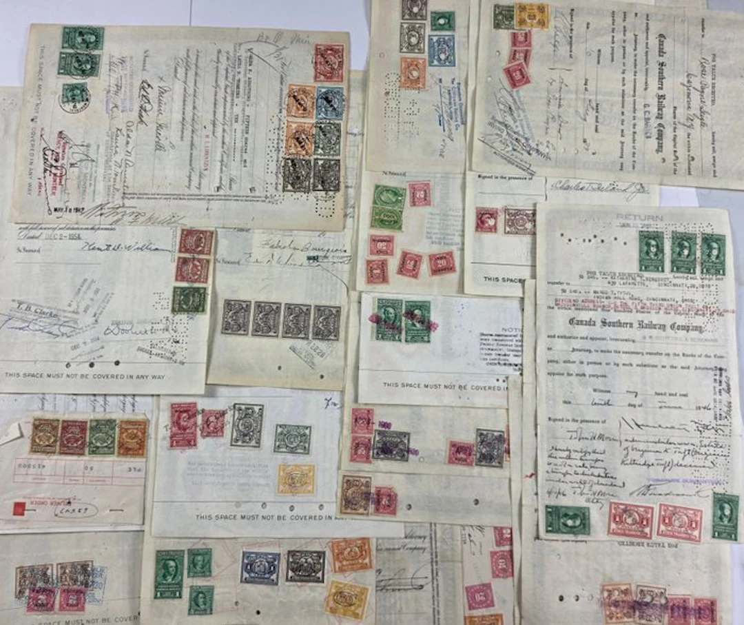 United States - Tax stamps attached to 20 shares of US trains.
